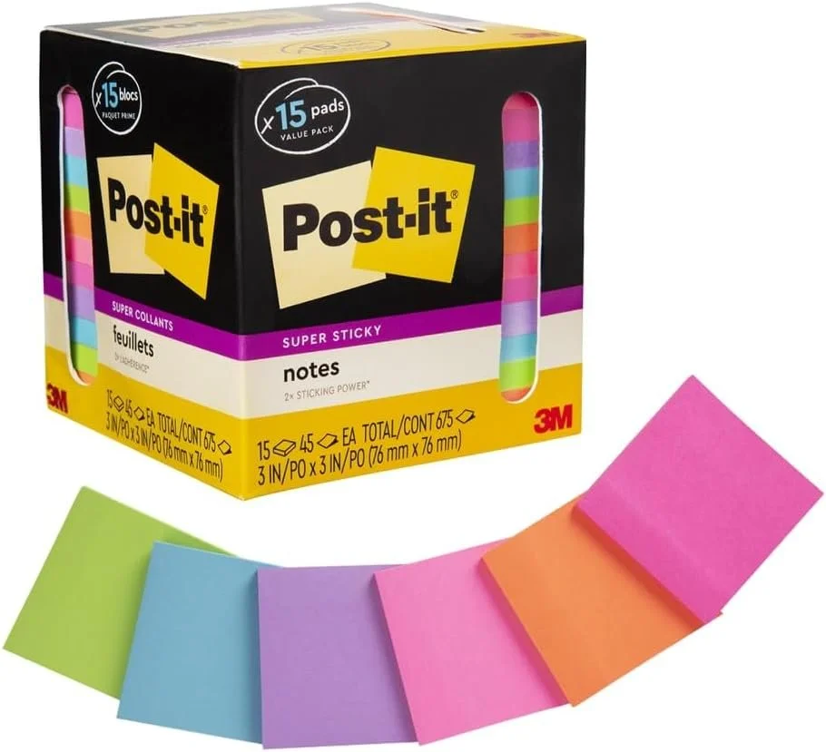 A box of Post-it notes with 15 colorful sticky pads in pink, orange, purple, blue, and green, displayed with some notes fanned out in front of the box.