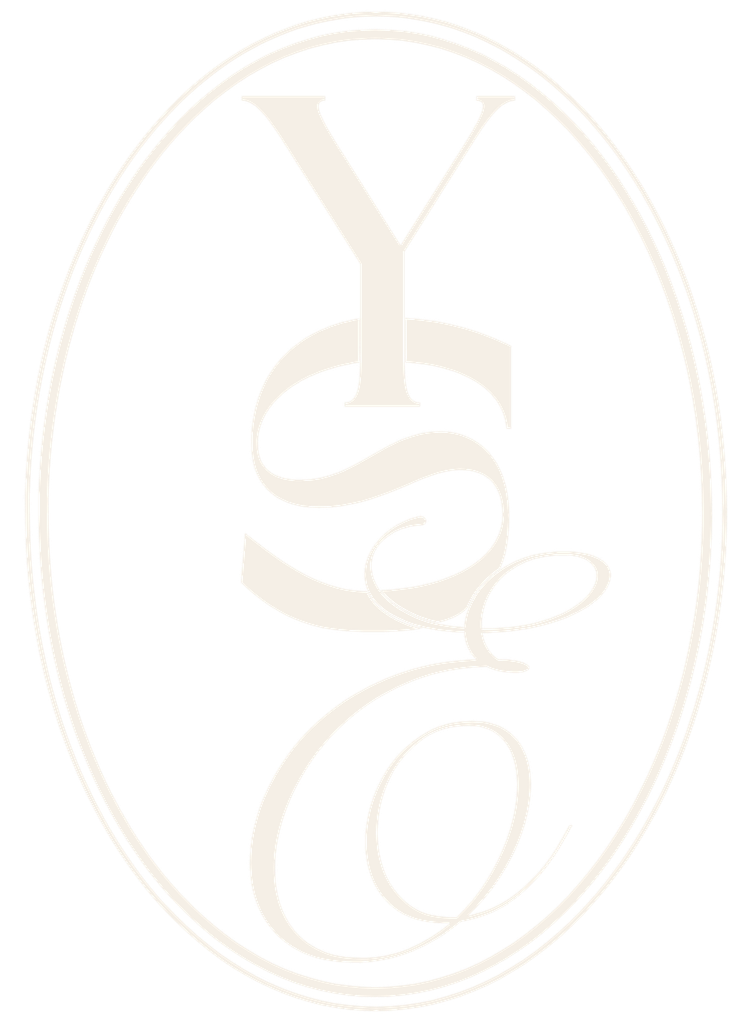 An oval logo featuring the stylized letters Y and S intertwined, with a decorative G at the bottom.