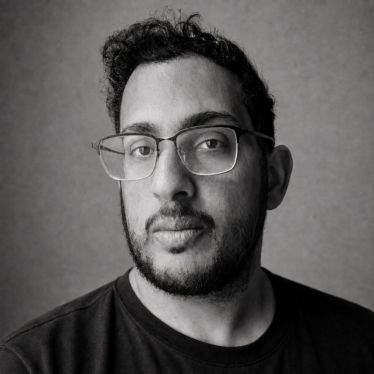 Black-and-white portrait of photographic artist Ariel Tanami.