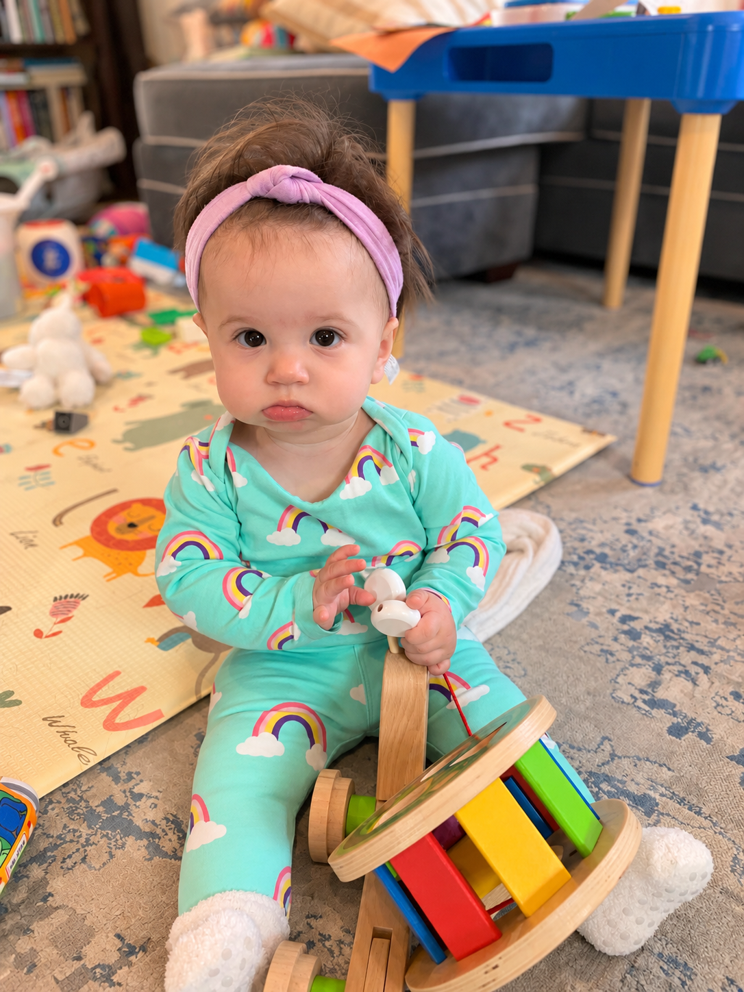 Cozy Baby Playtime on the Mat.png