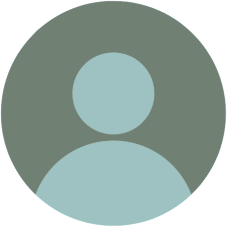 Generic user profile avatar with a circular head and shoulders silhouette on a gray background.