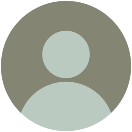 Generic user profile icon with a gray background and a simplified outline of a person's head and shoulders.