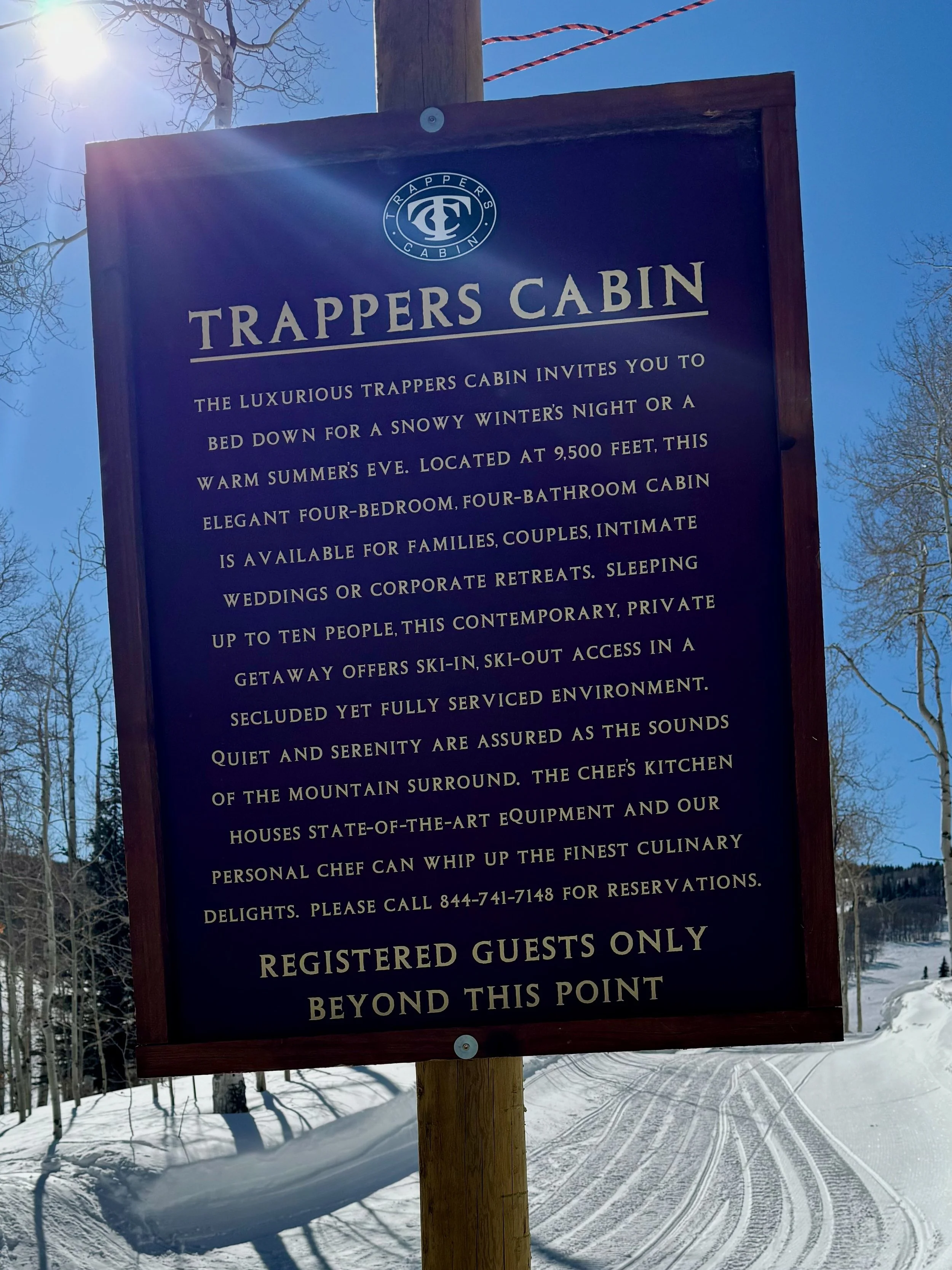 Image of on-trail sign for Trapper's Cabin -- an ultra luxury slope side cabin at Beaver Creek Ski Resort, Colorado