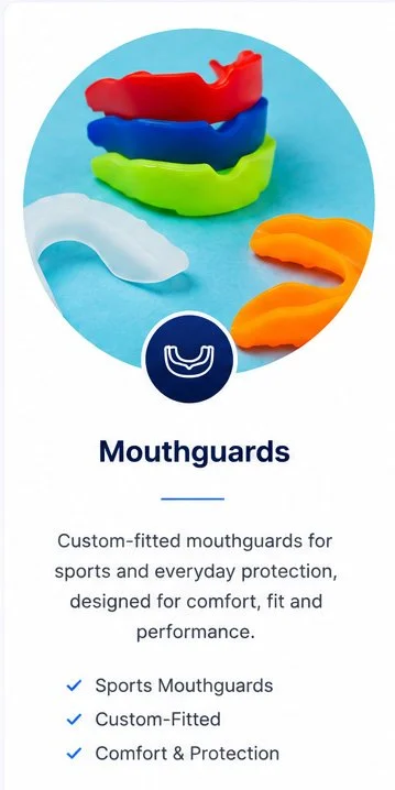 Colorful rubber mouthguards, including red, blue, green, white, and orange, arranged in a stack on a light blue background, with a navy blue circle featuring a white smiley face and the word "Mouthguards" underneath.