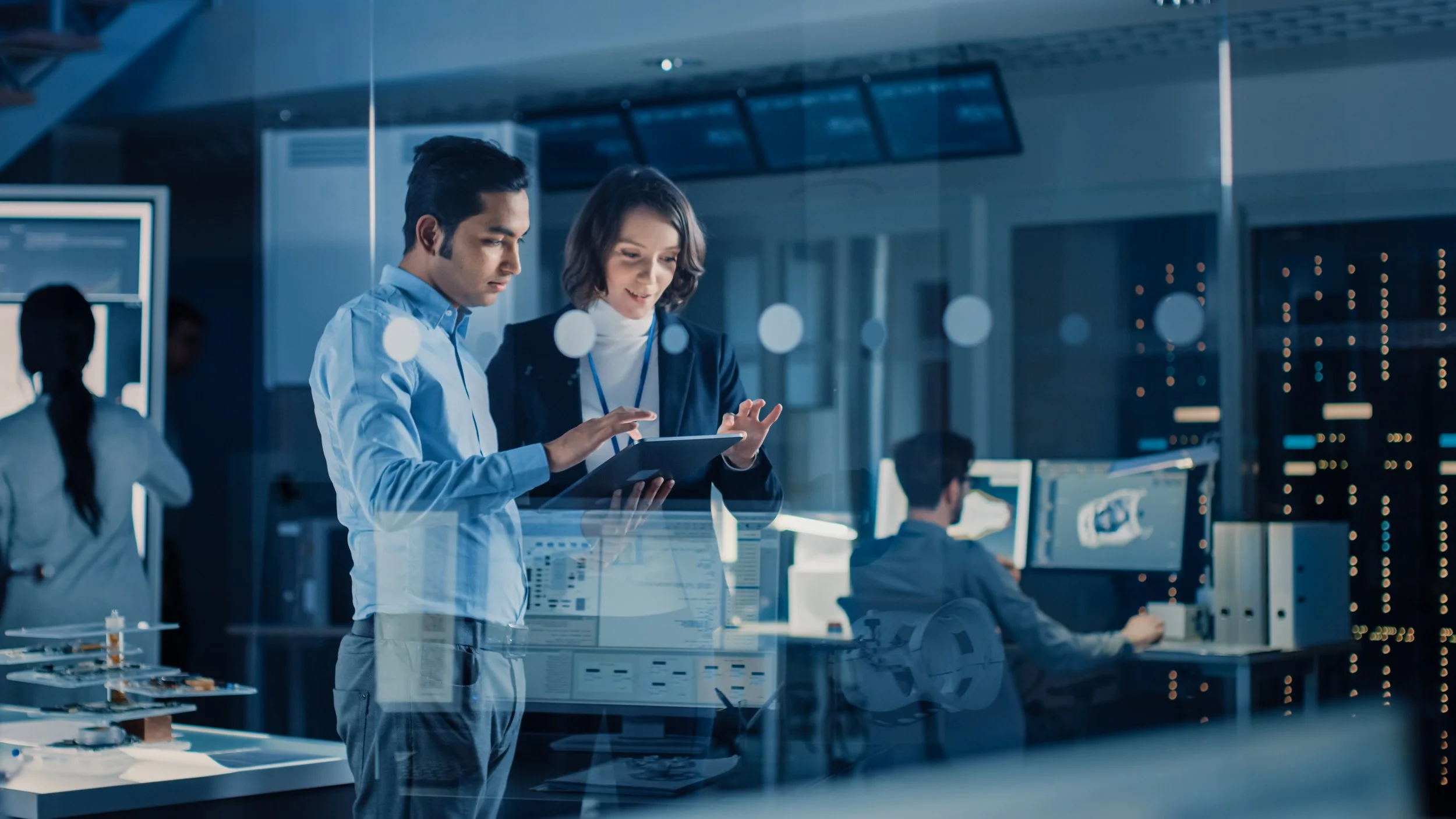 IT team managing business systems and servers in a data center