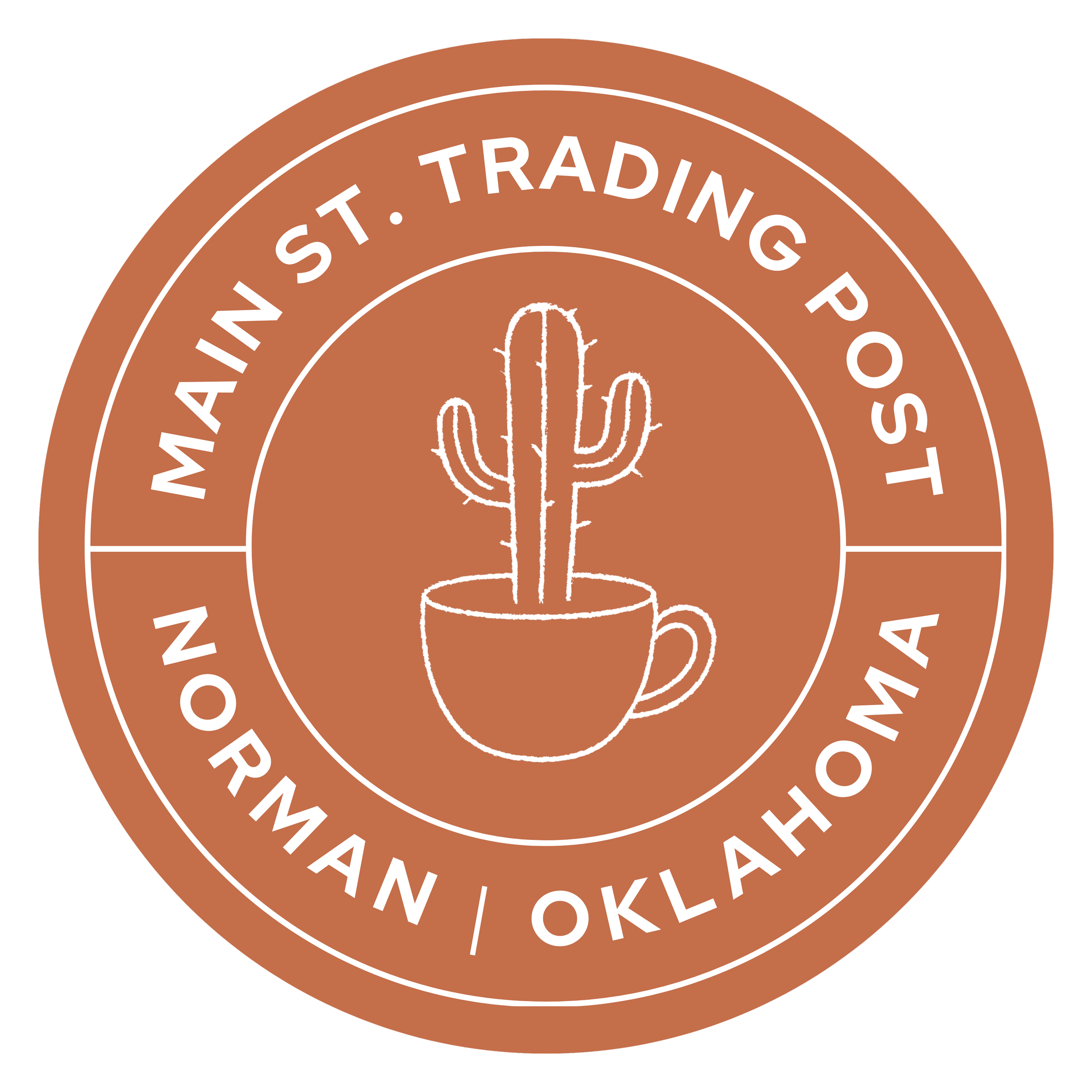 Circular badge with a cactus illustration and the words "MAIN ST. TRADING POST NORMAN OKLA" around the edge in white text on a brown background.