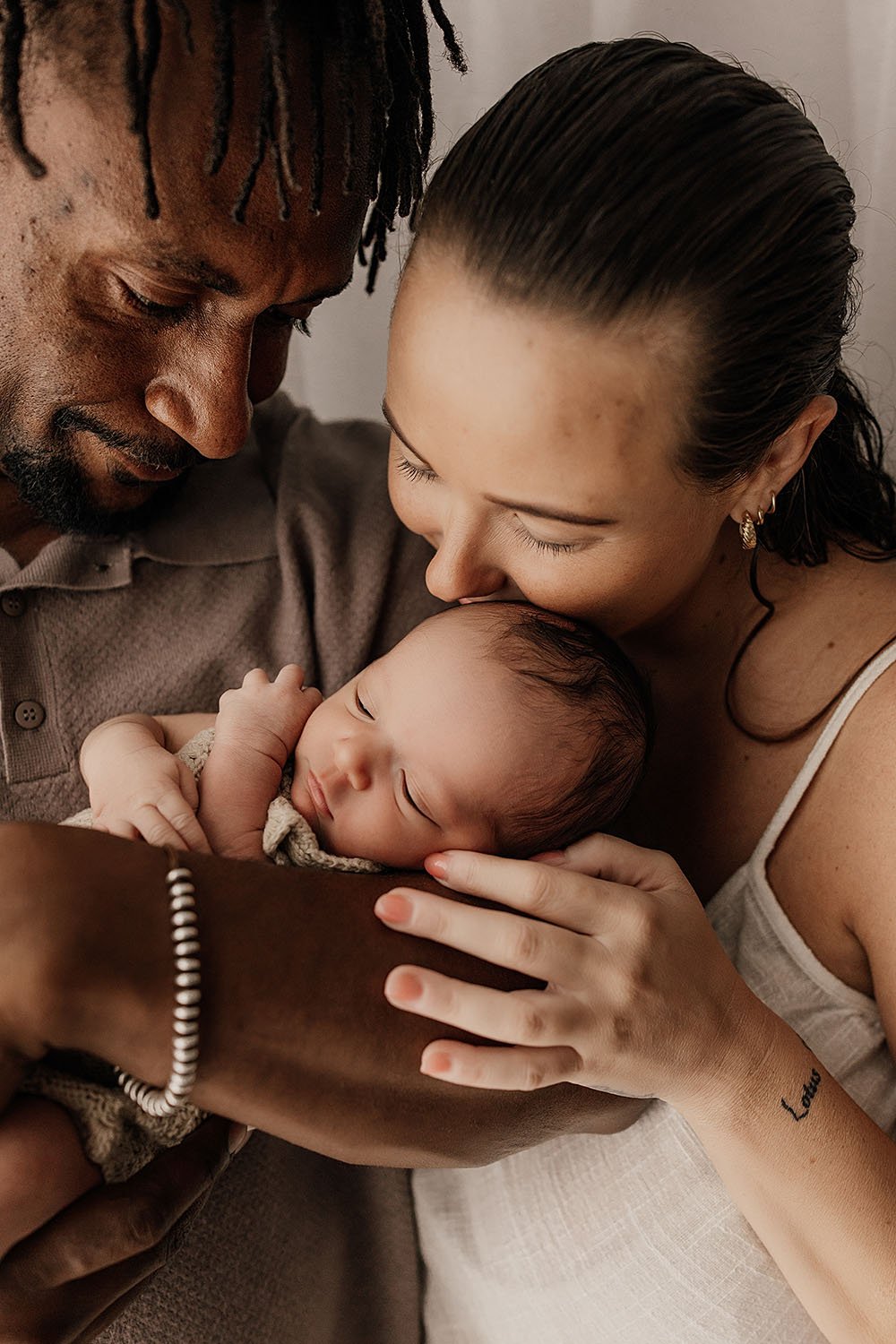 parents-with-newborn-baby-photo-session-nt.jpg