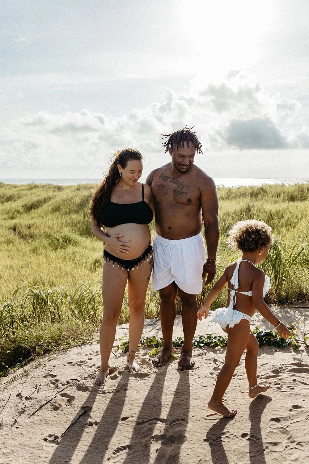 A young family outside in Darwin. Rural family photo shoot by Captured by Cody.