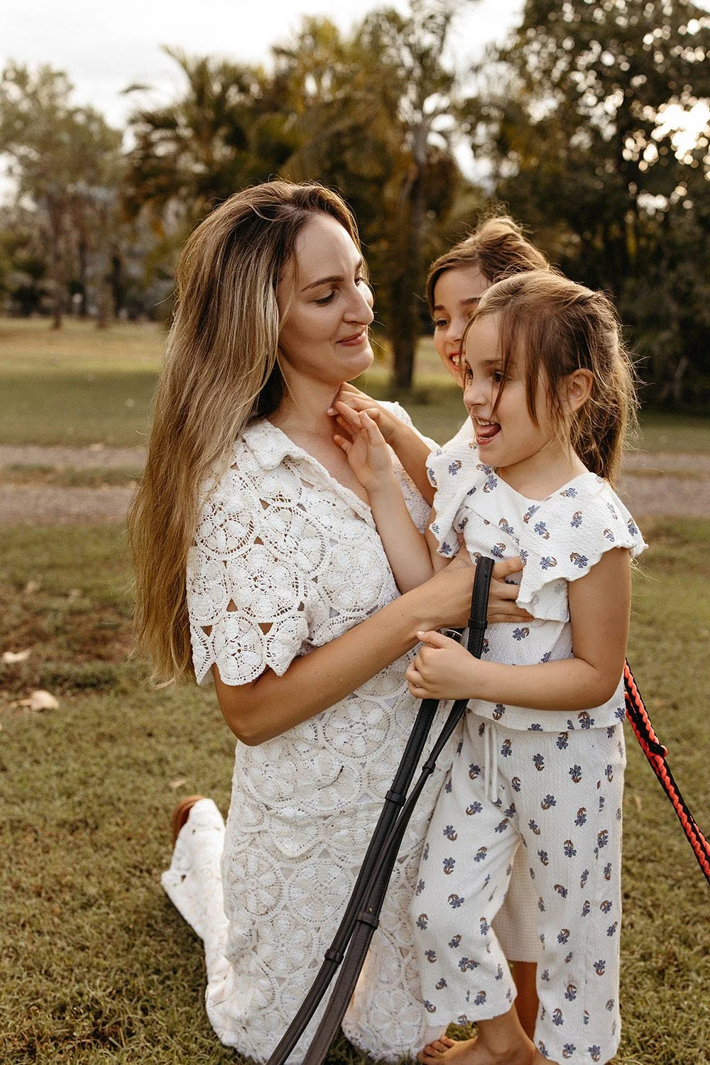 A mother and her two young daughters, outside in rural NT. Family photo shoot, Captured by Cody, Darwin & Palmerston.