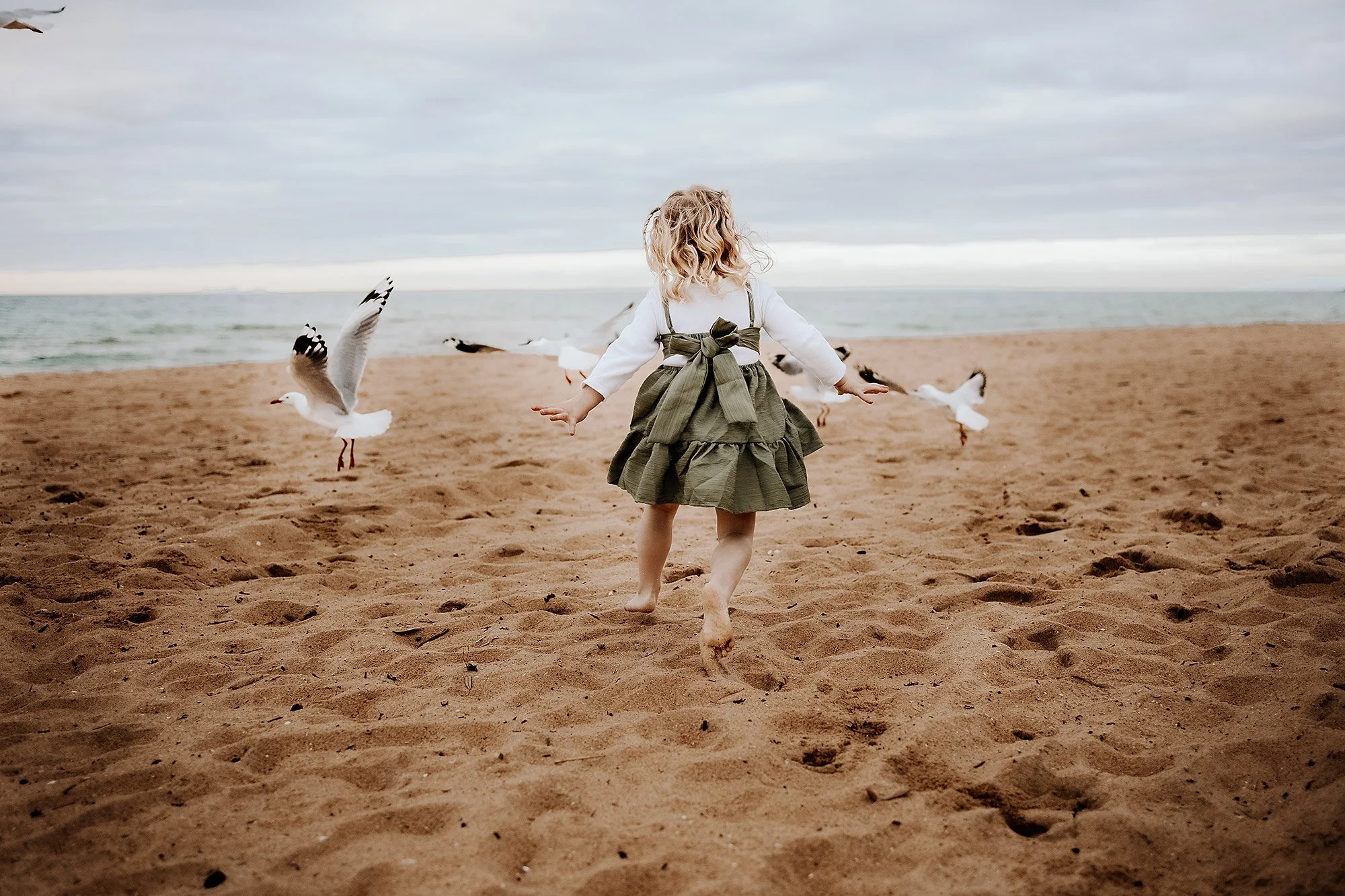 young-girl-pn-beach-family-photo-session.jpg