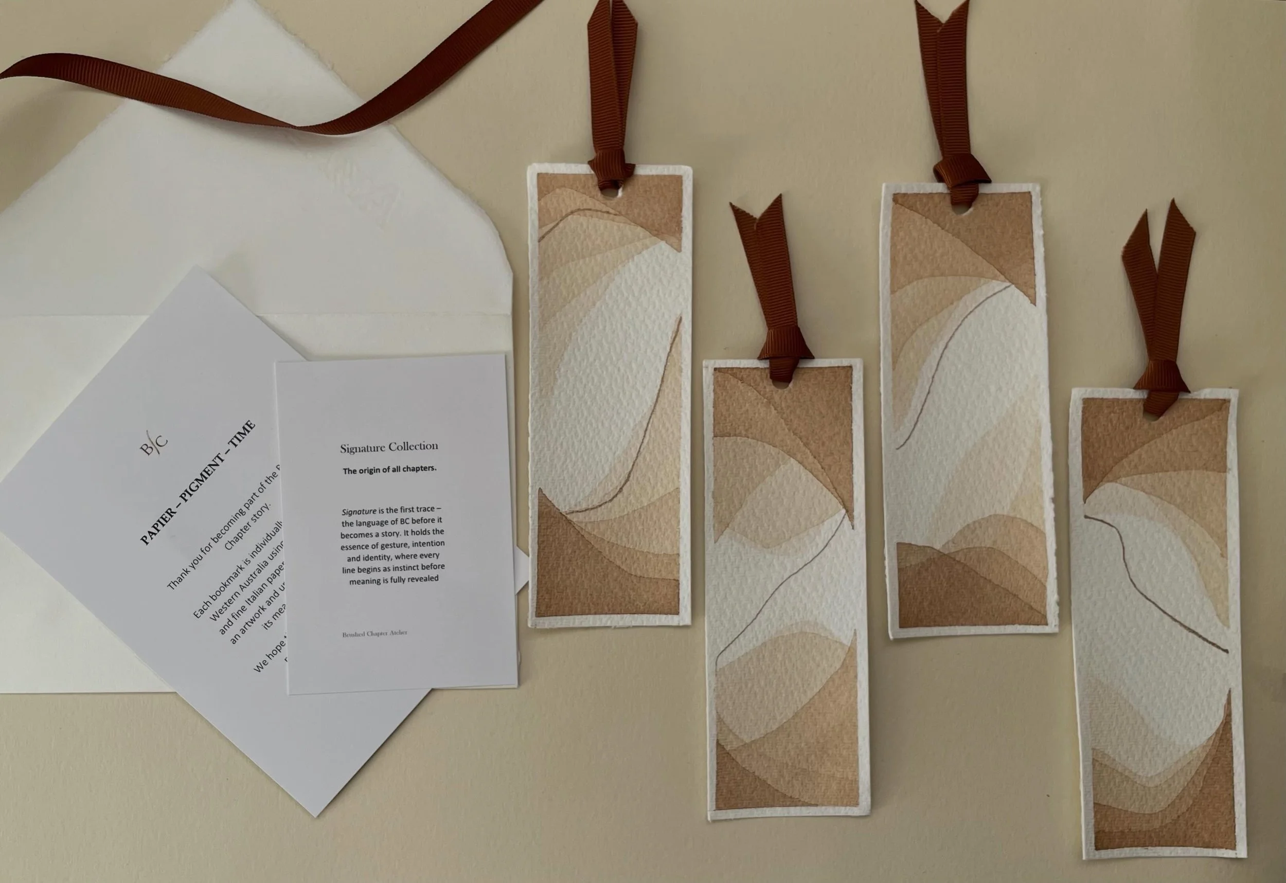 Before a story is told, there is a trace.

Before meaning unfolds, there is a gesture.

Signature is the first chapter of Brushed Chapters Atelier &mdash; a collection of hand-painted bookmarks exploring movement, identity, and the beauty of becoming