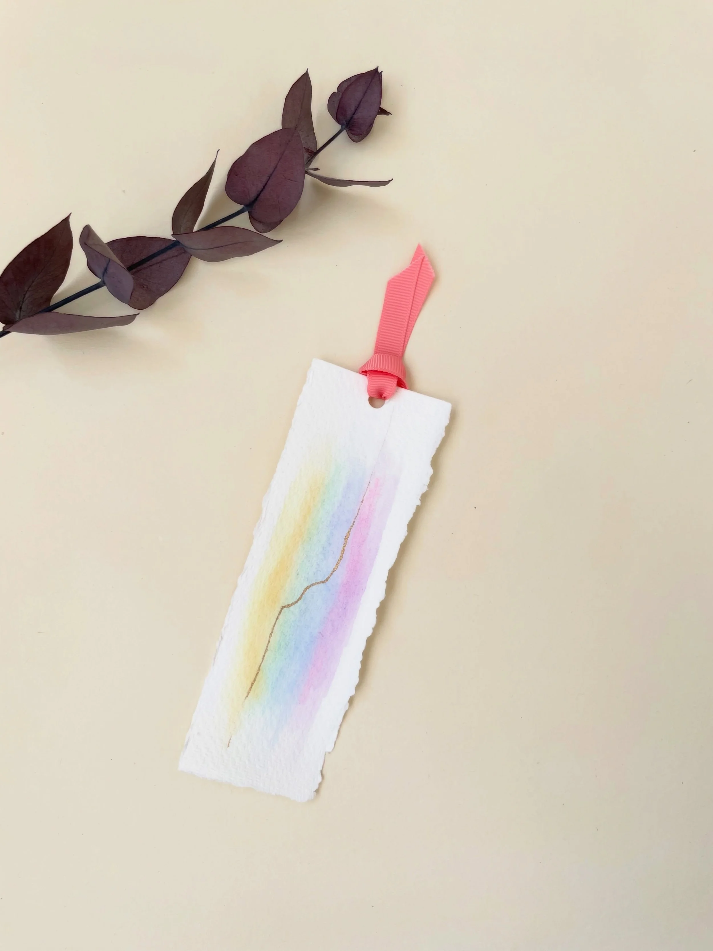 Tiny details, made to be treasured.

A hand-painted watercolor rainbow bookmark, created as a timeless baby keepsake. Soft colours, delicate brushstrokes and artisan craftsmanship come together to create a meaningful piece that celebrates the beginni