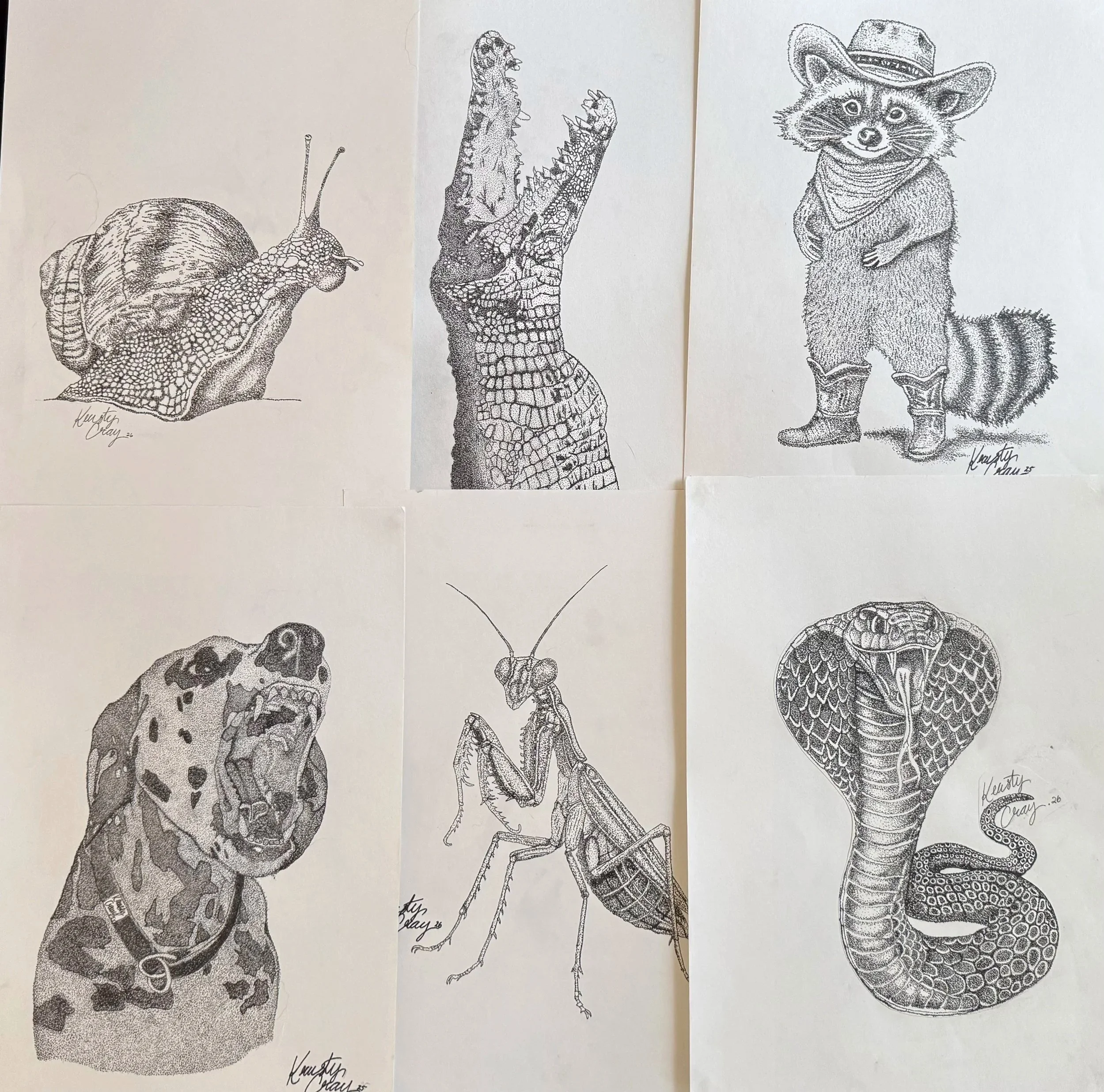 Three black-and-white drawings of animals and a bird. The first is a snail, the second is a crocodile, and the third is a fox dressed in cowboy attire with a hat and bandana. Each drawing is signed "Krauty Cray" with a date.