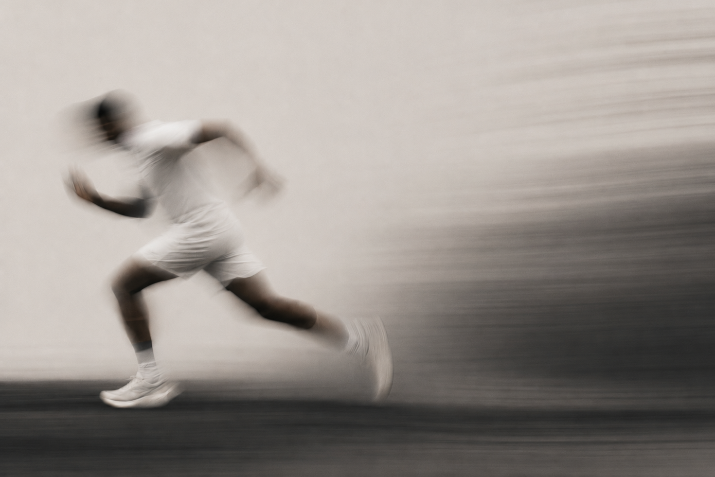 Athlete in motion representing physical performance and mental drive — athlete performance coaching by Ryan Chhajed.