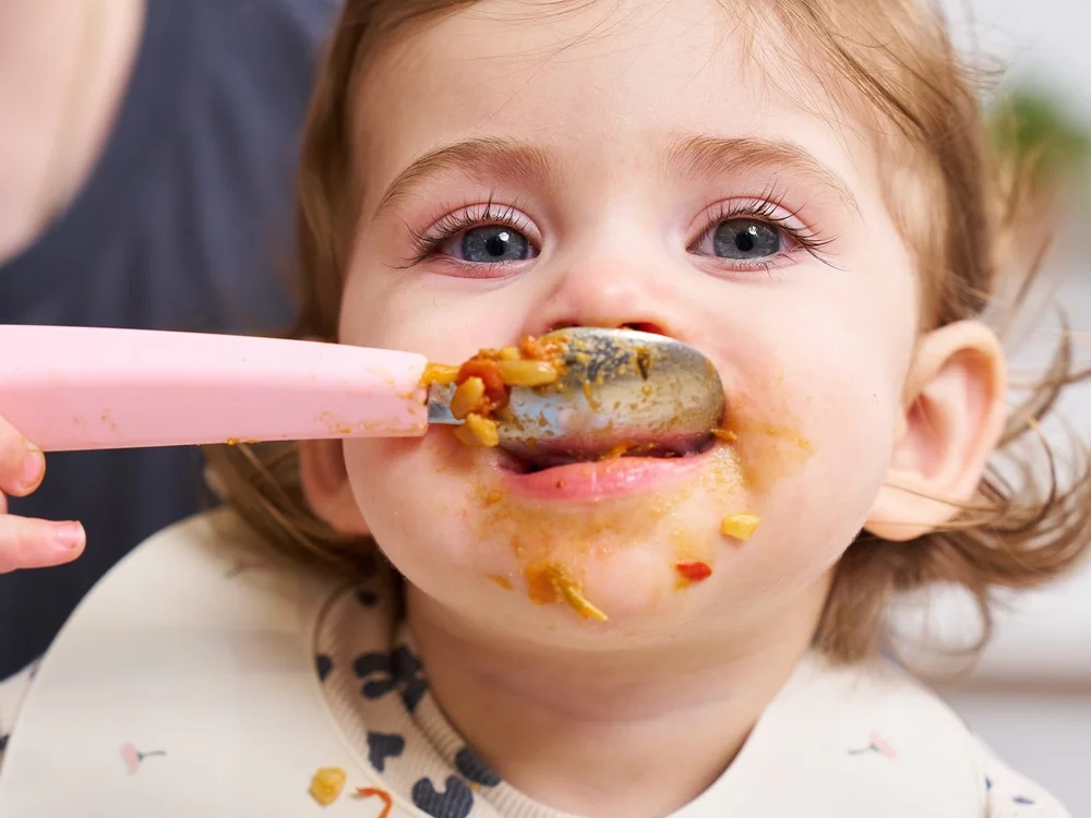 A Pots for Tots customer mid-meal