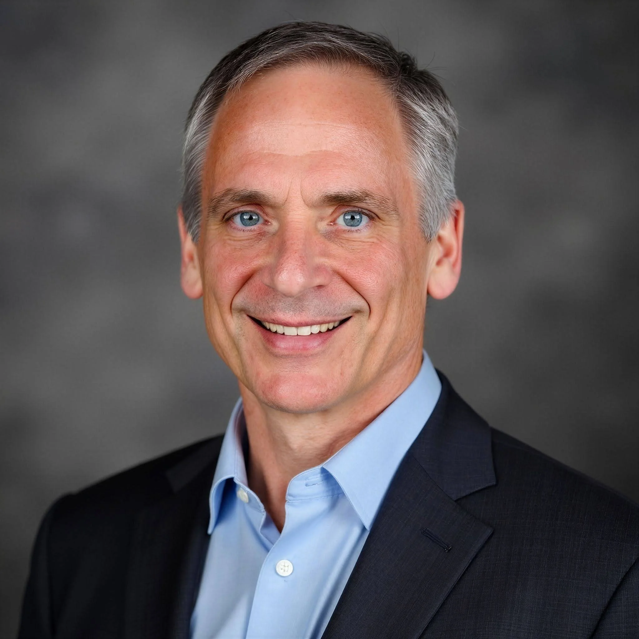 Portrait of Kerry Martin, founder of Unitas Brokerage.