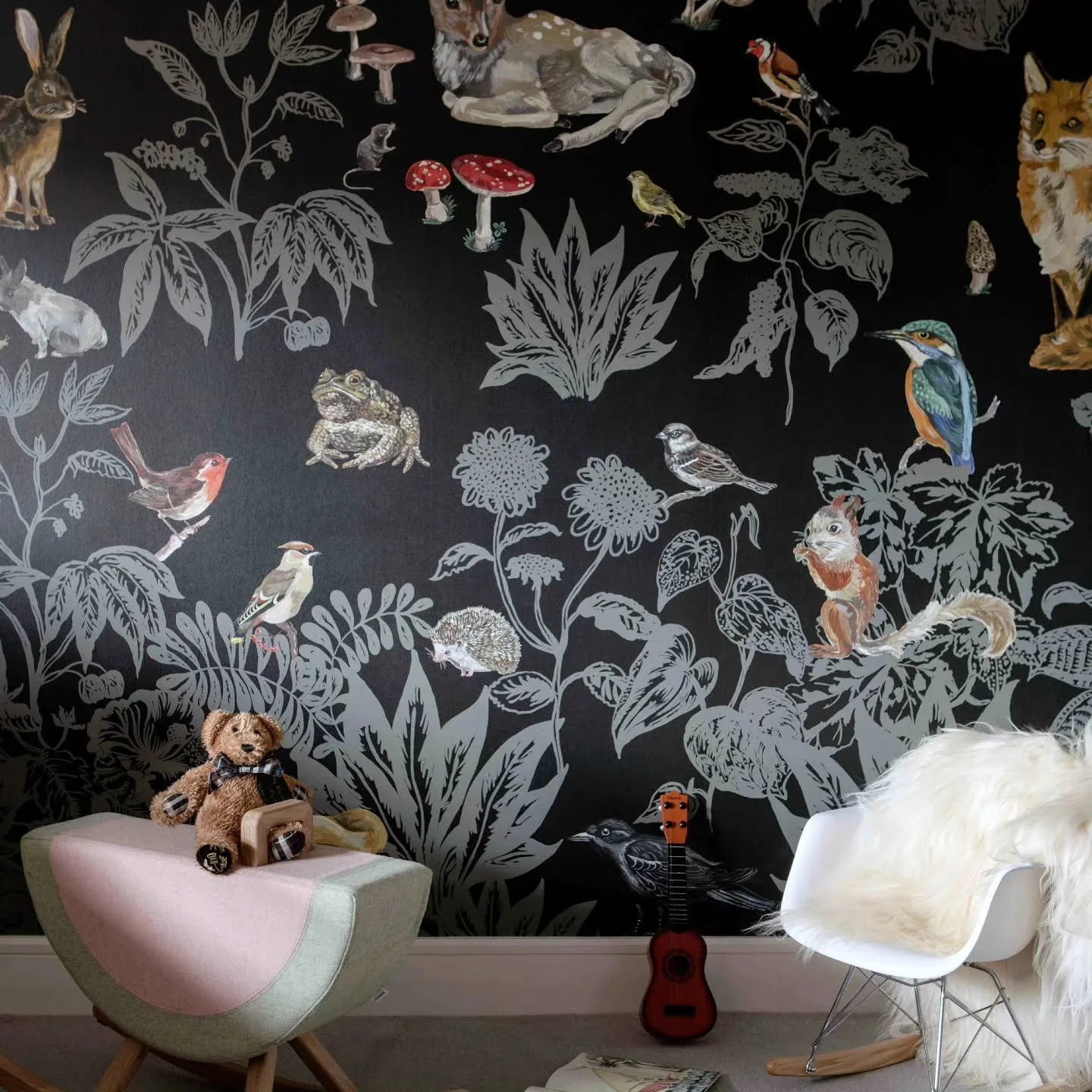 We found this wallpaper by Nathalie L&eacute;t&eacute; and knew it belonged in our client's daughter's room. The background is black rather than the pale tones you'd expect in a child's room, and every animal, fox, deer, bird, is hand illustrated rat