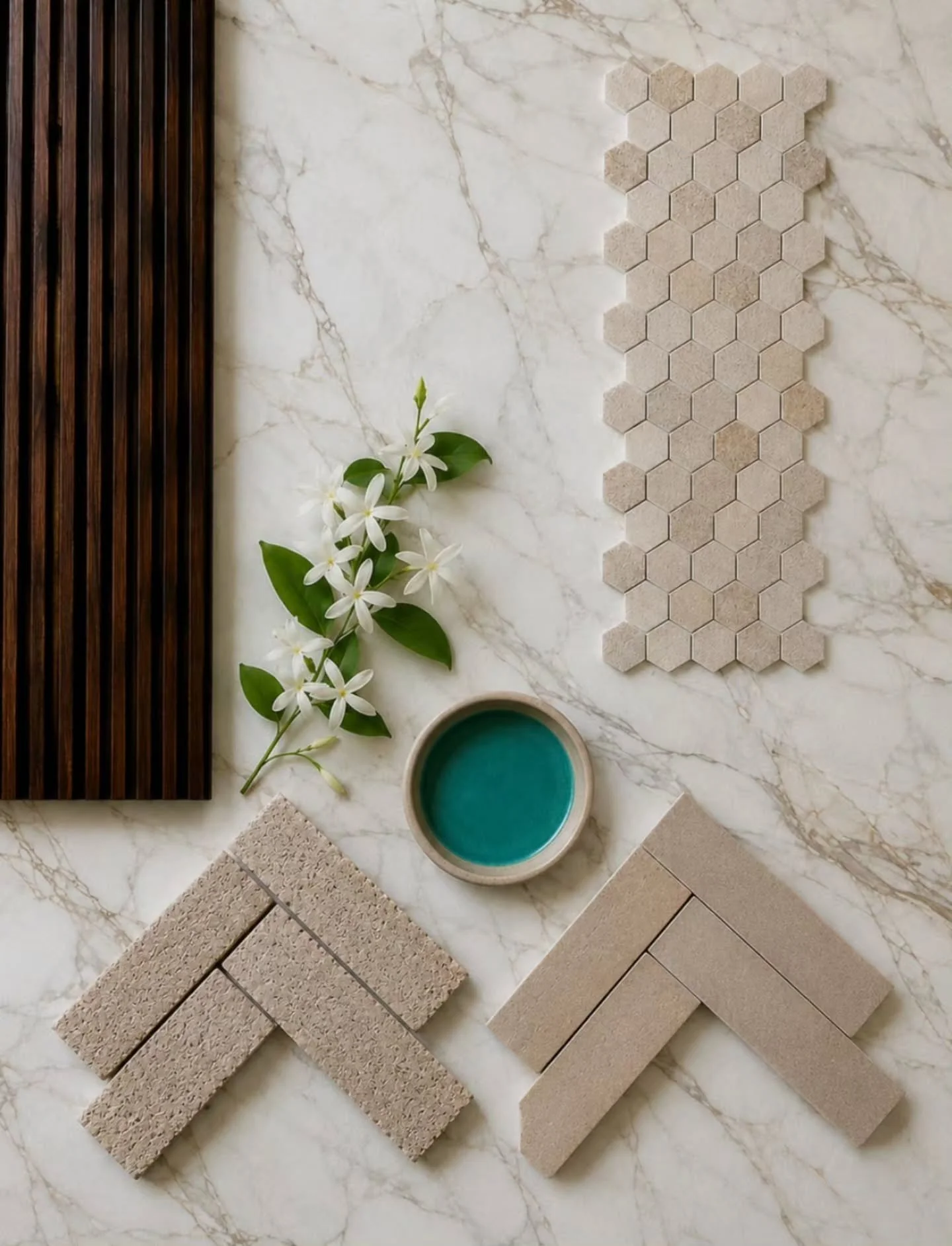 This flatlay is the material palette for a swimming pool and outbuilding conversion, for a client we've worked with before. 

The interior is being turned into a steam room, shower, and WC. The pool and its surround are both laid in herringbone. We'r