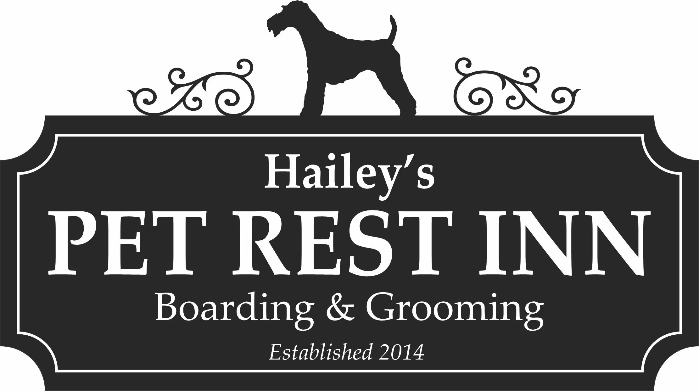 Black and white sign for Hailey's Pet Rest Inn, a boarding and grooming business, featuring a silhouette of a dog on top, decorative scrollwork, and the establishment date, 2014.