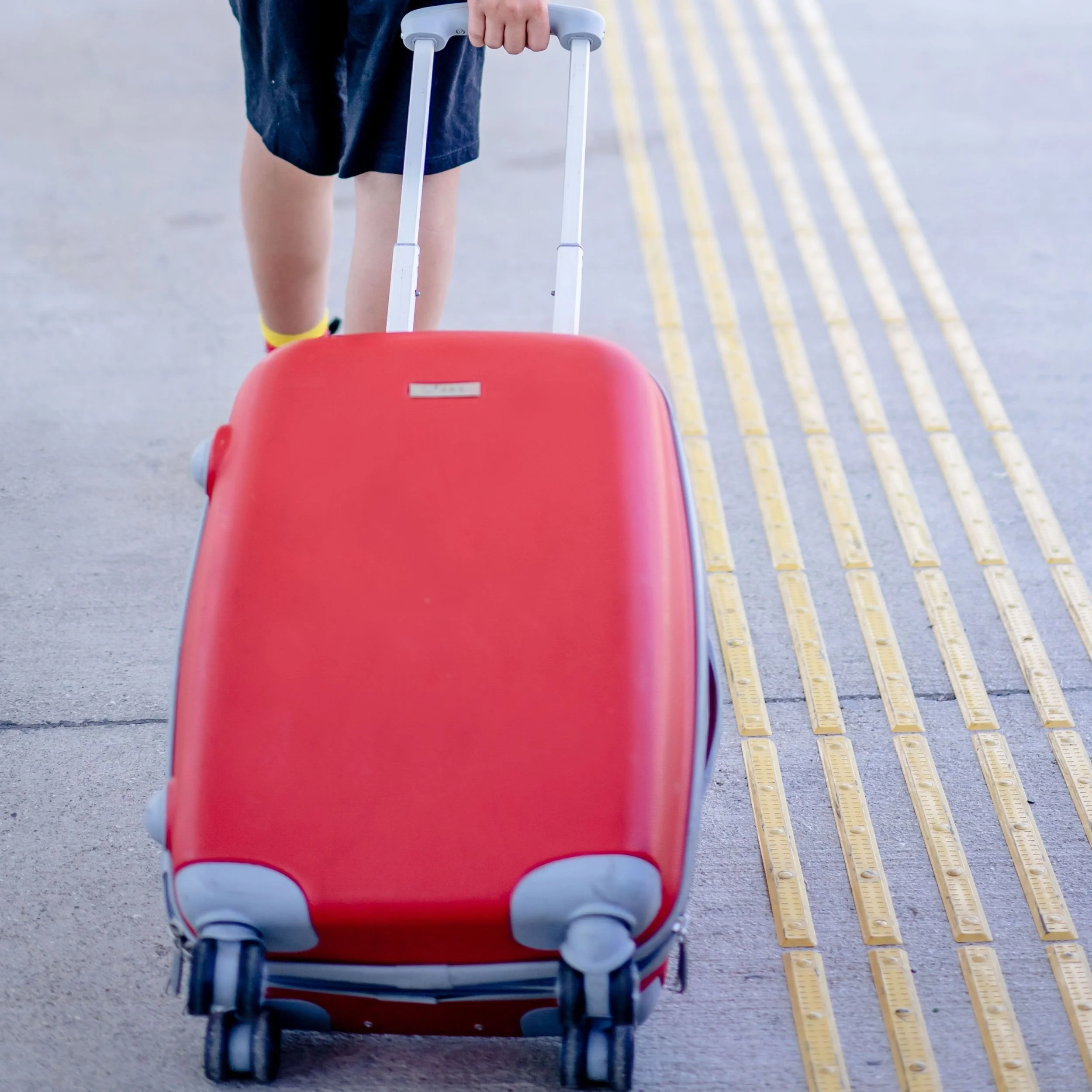 Person pulling suitcase.jpg