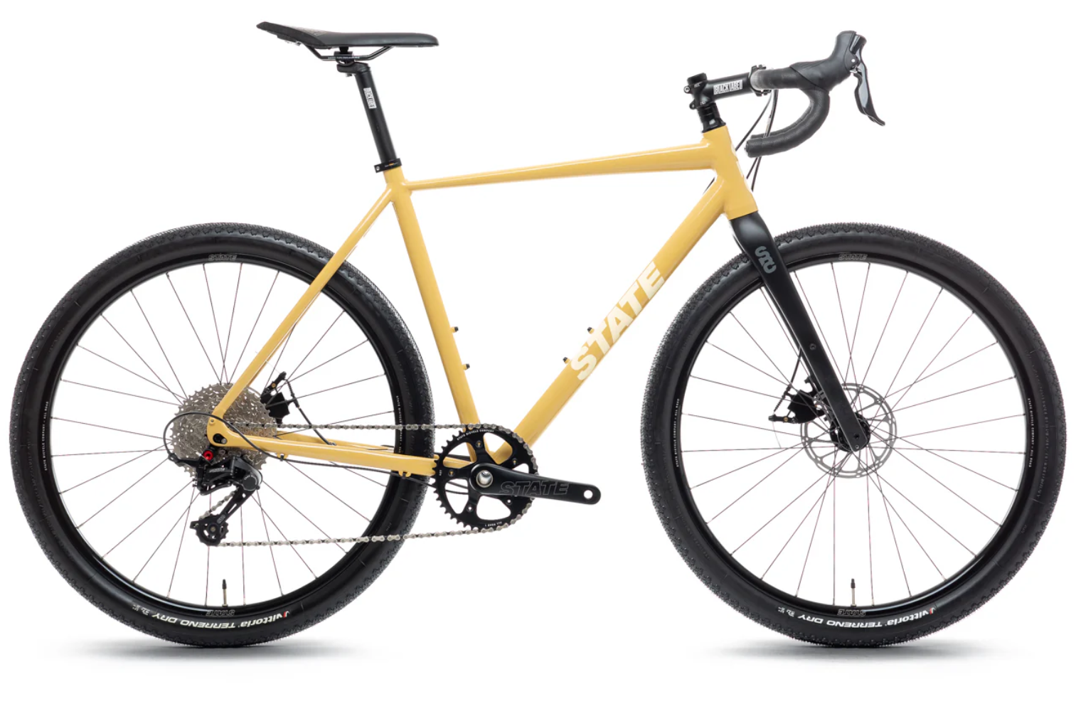 Yellow and black mountain bike with disc brakes, flat handlebars, and thick tires.