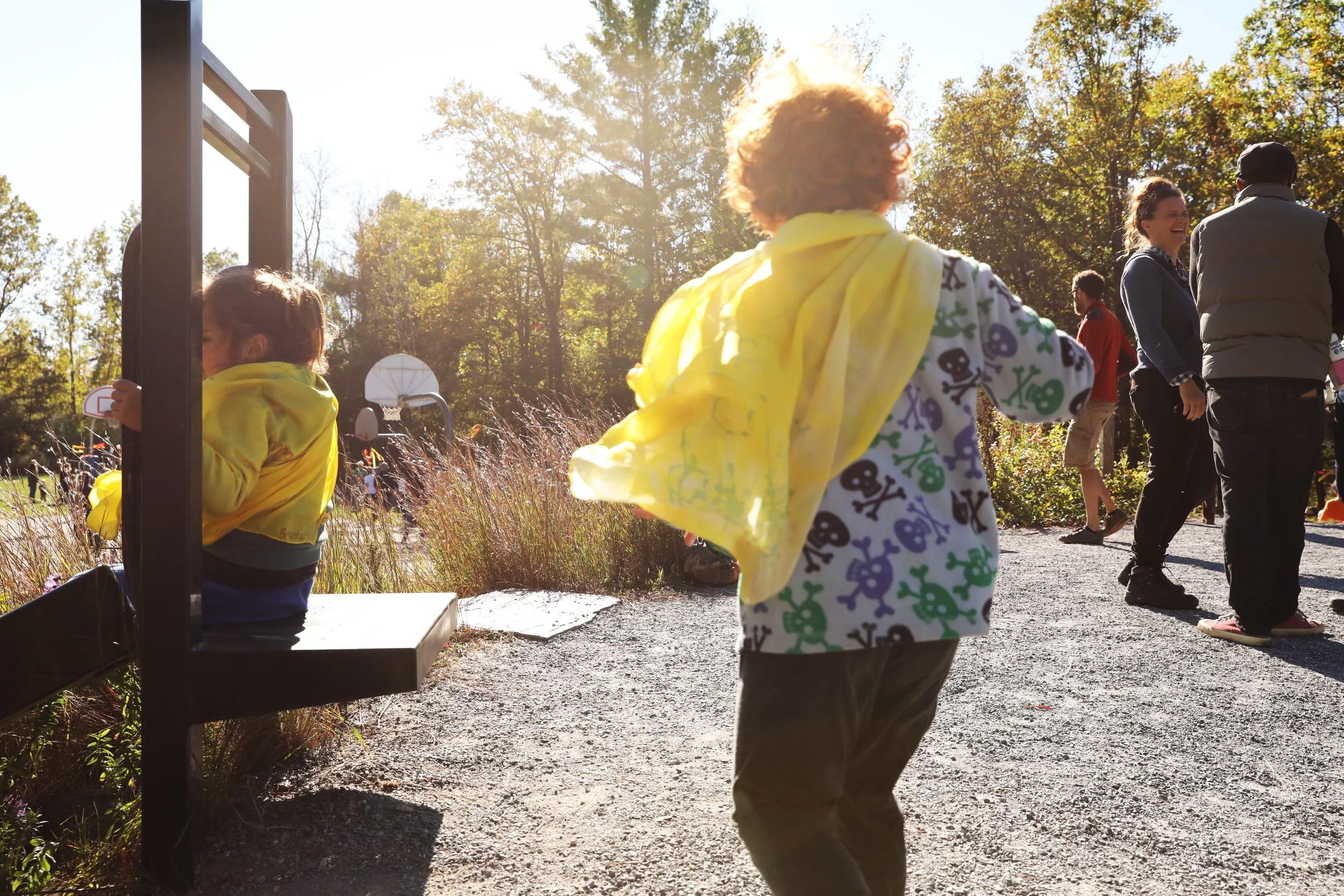 Ealry childhood students playing outdoors at a school festival