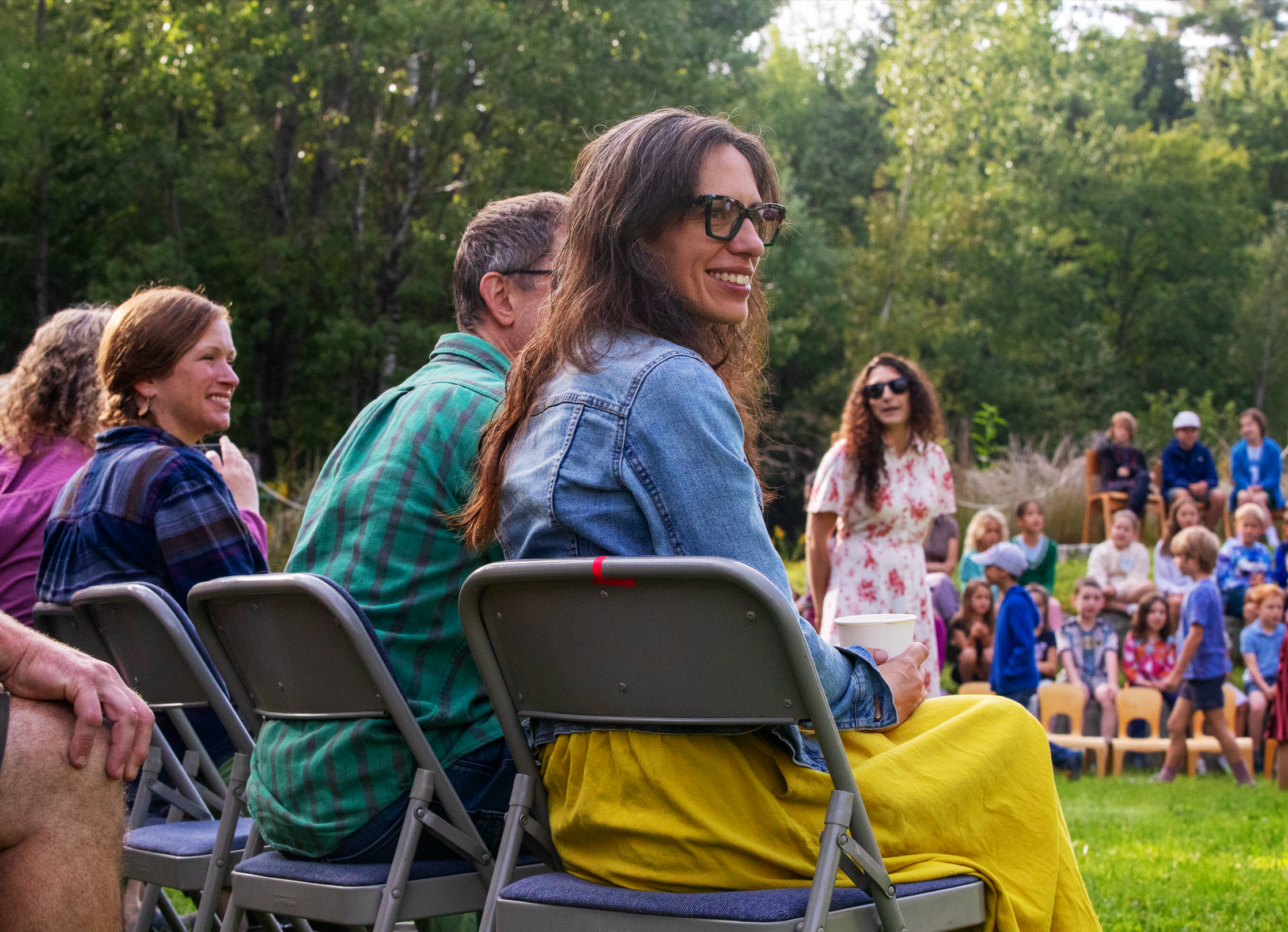 Community members smiling outdoors