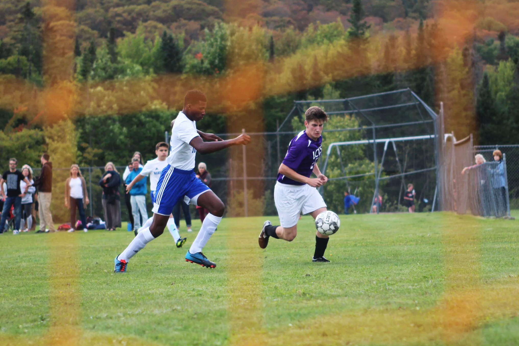 High school boy's soccer team playing a match
