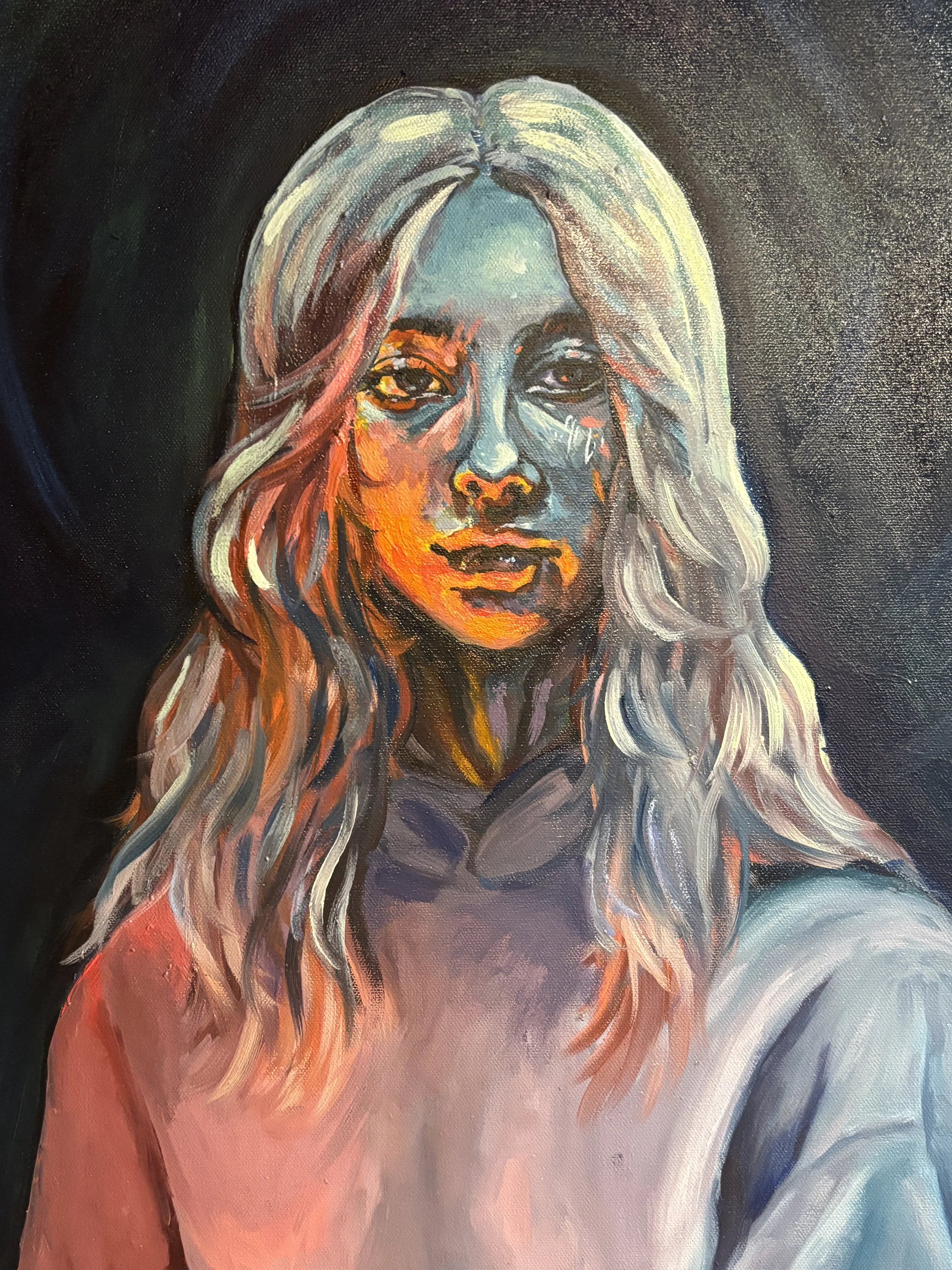Self-portrait of a student with dramatic lighting
