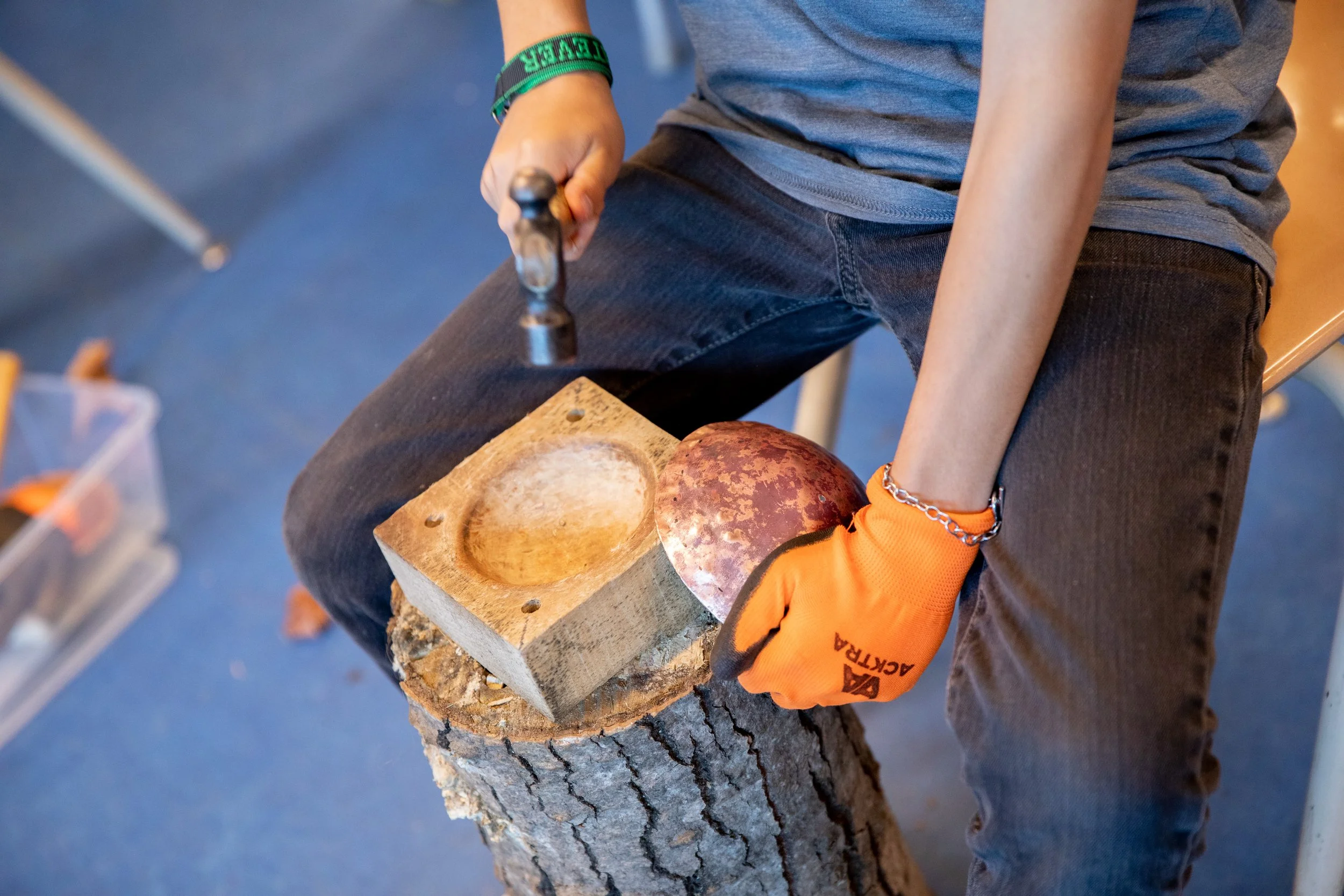 Boy doing metalwork