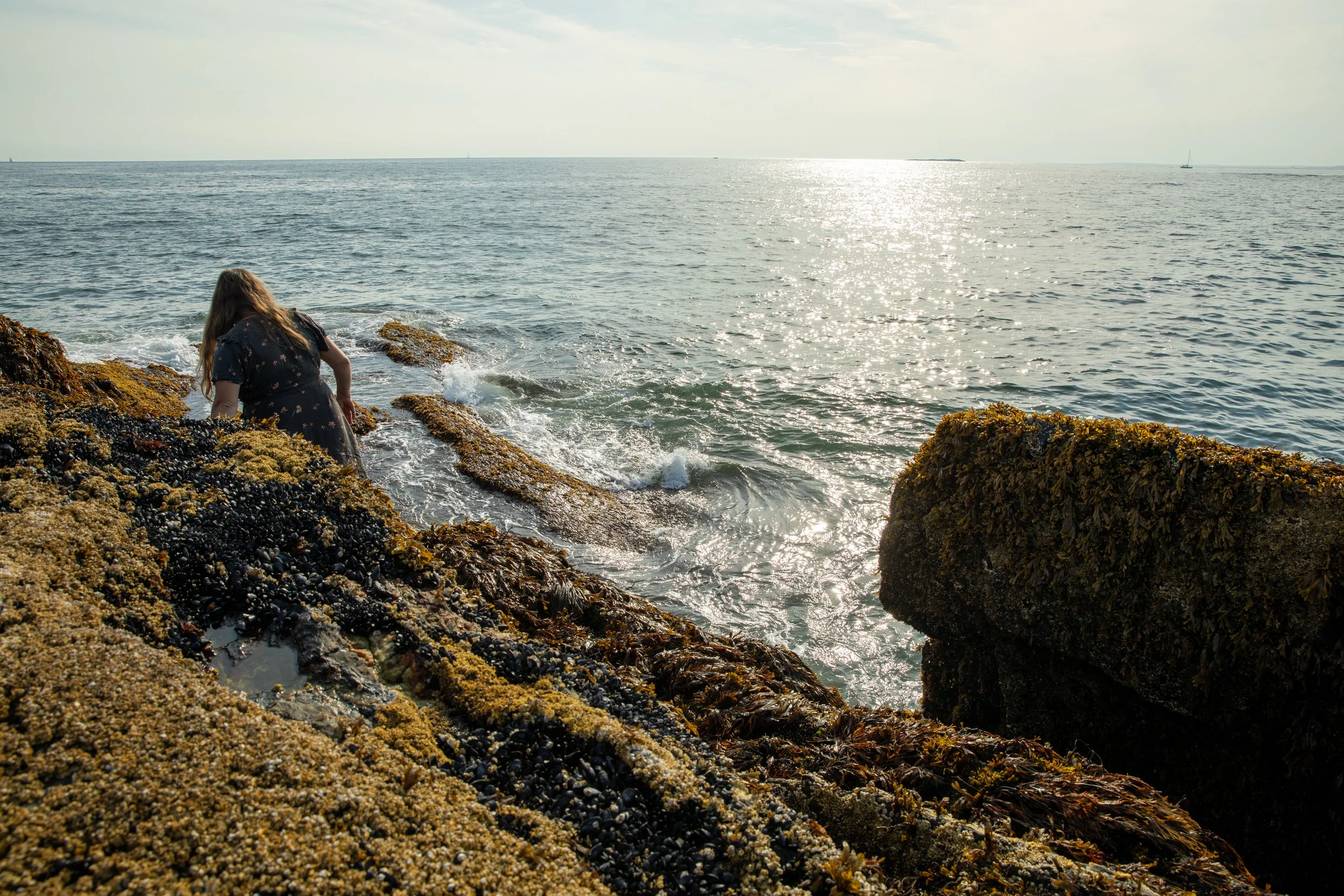 High school student walking on the coastline