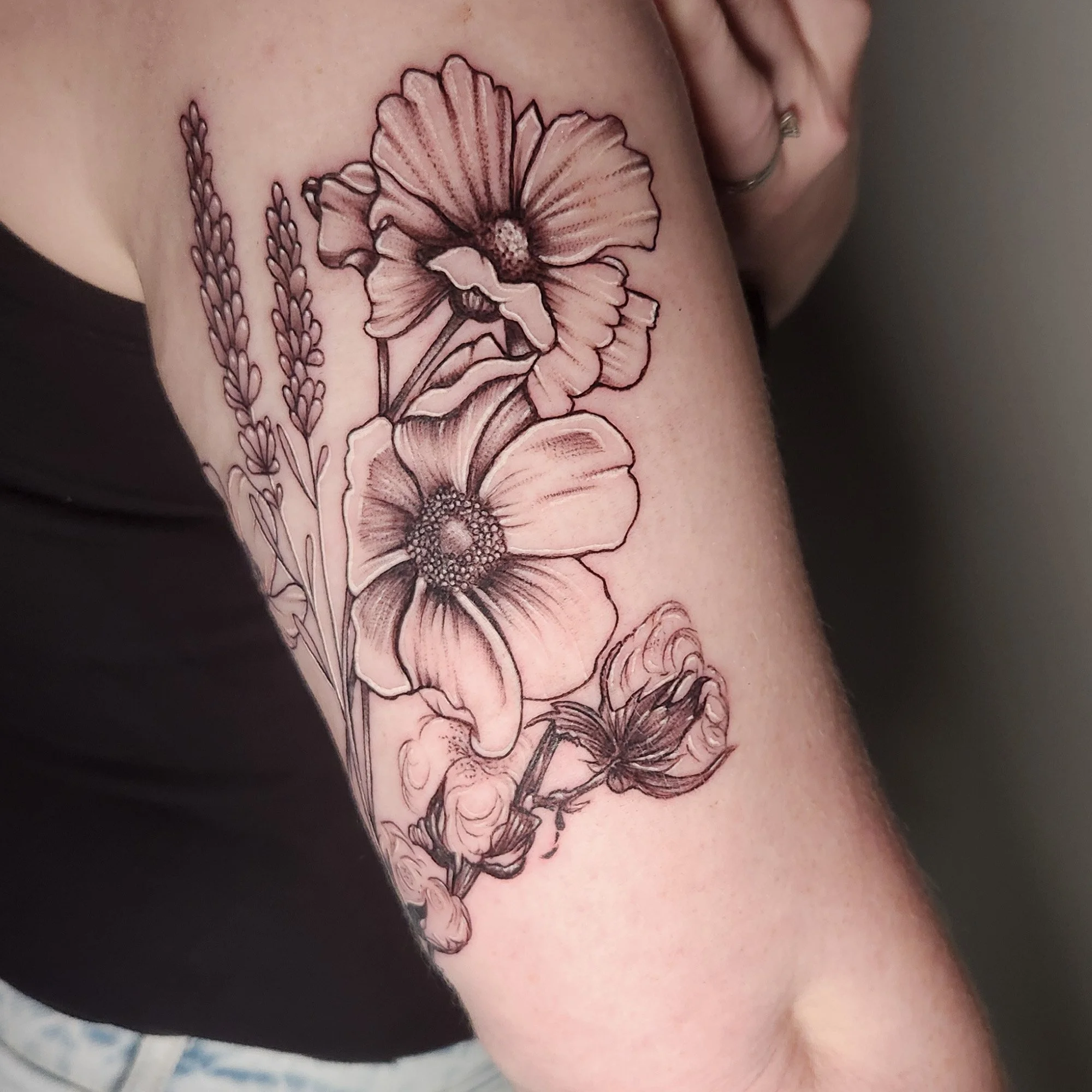Fine line work, wild flowers tattoo