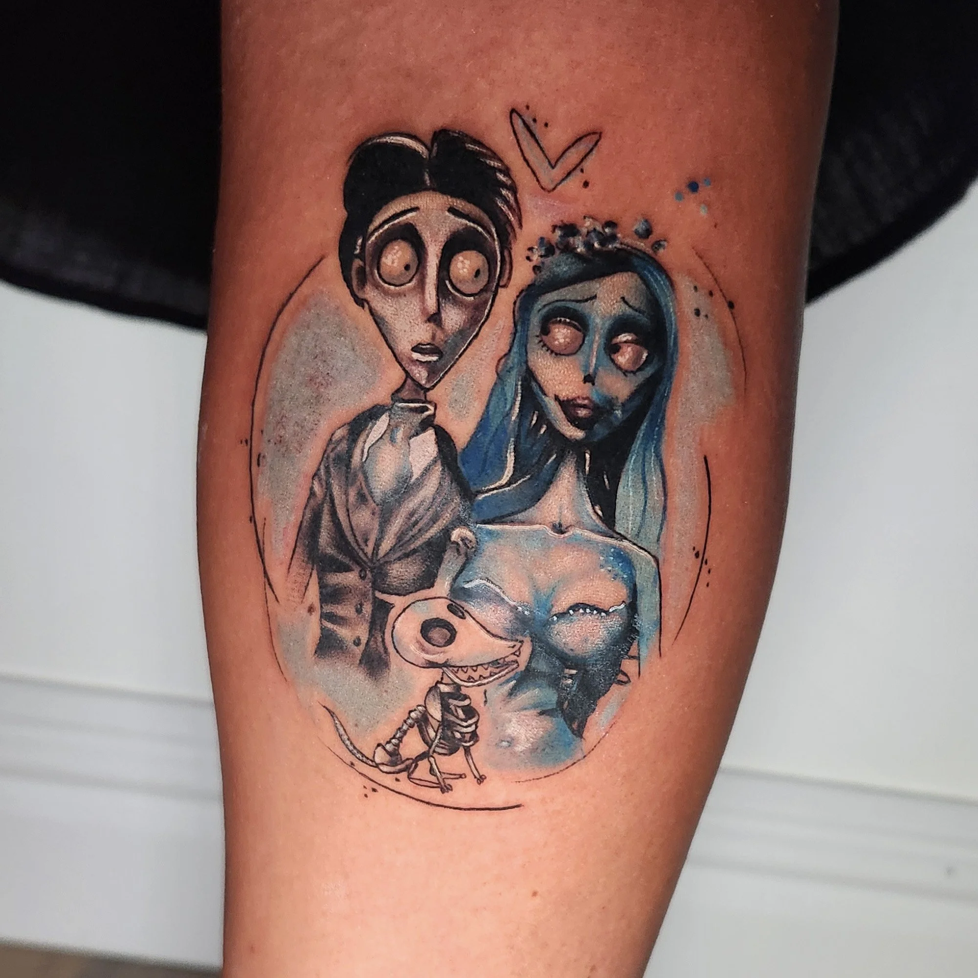 Tattoo of a skeleton horror bride and groom