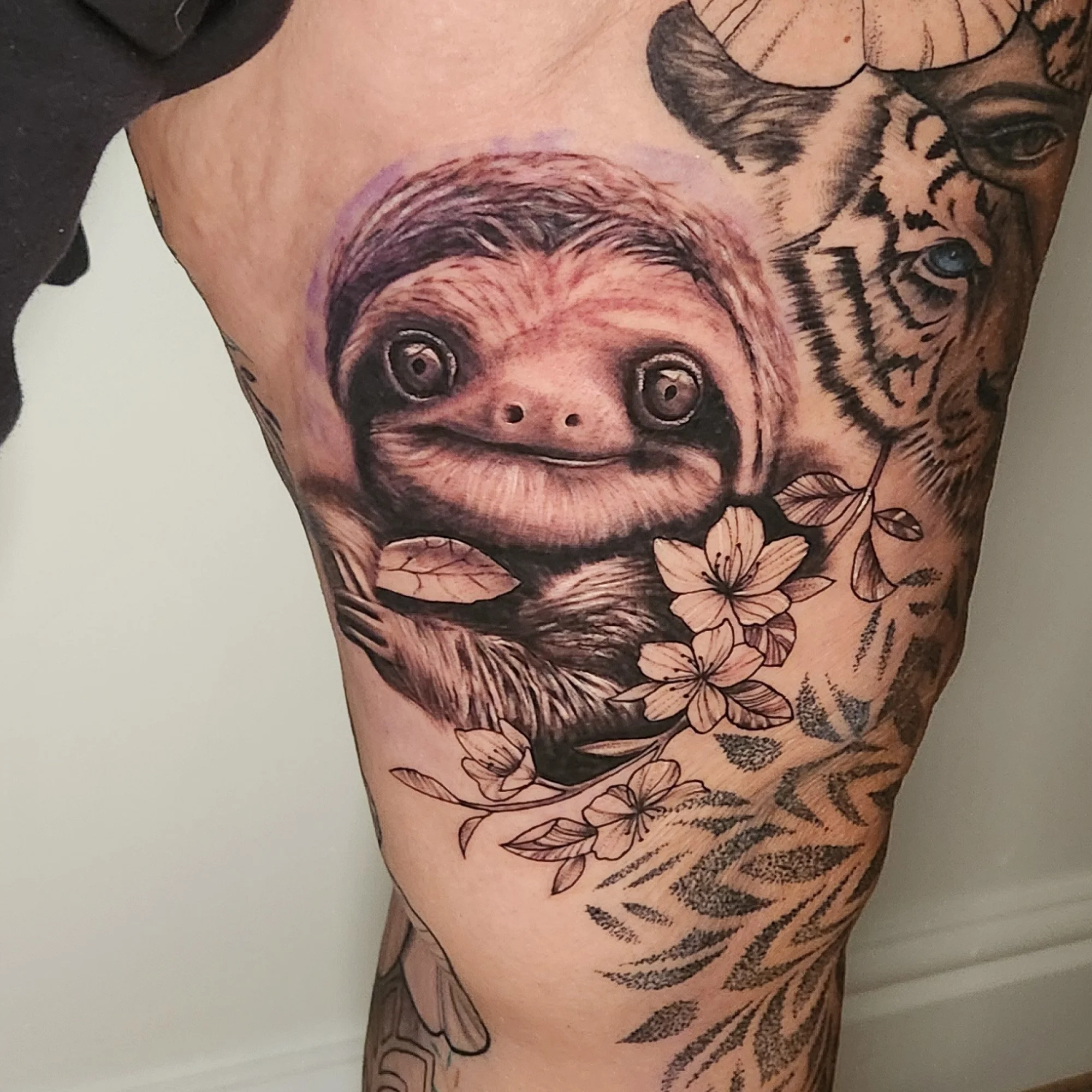 Tattoo of sloth.