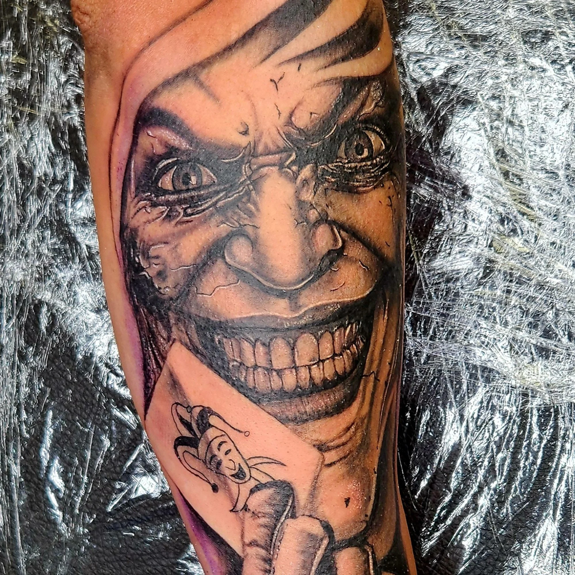 Black and grey, realistic portrait on the joker
