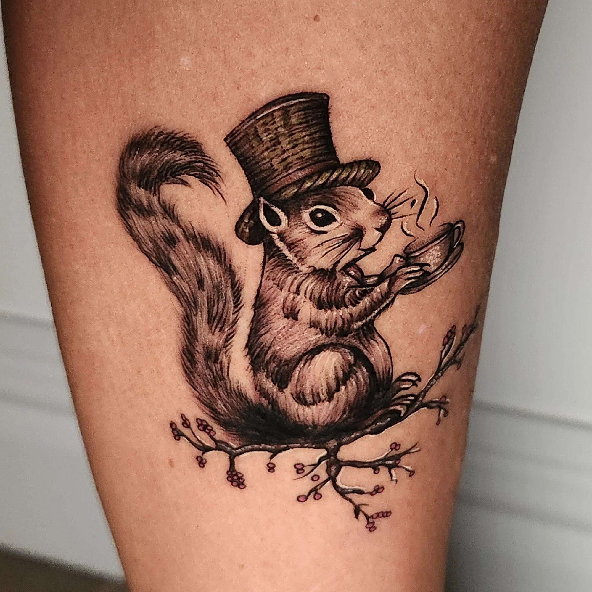 Squirrel in top hat and drinking tea tattoo