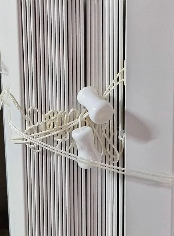 This is a picture of a Venetian blind after it was cleaned by D12 Blinds