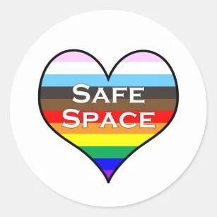 A heart-shaped graphic with rainbow stripes and the words "SAFE SPACE" written across the center.