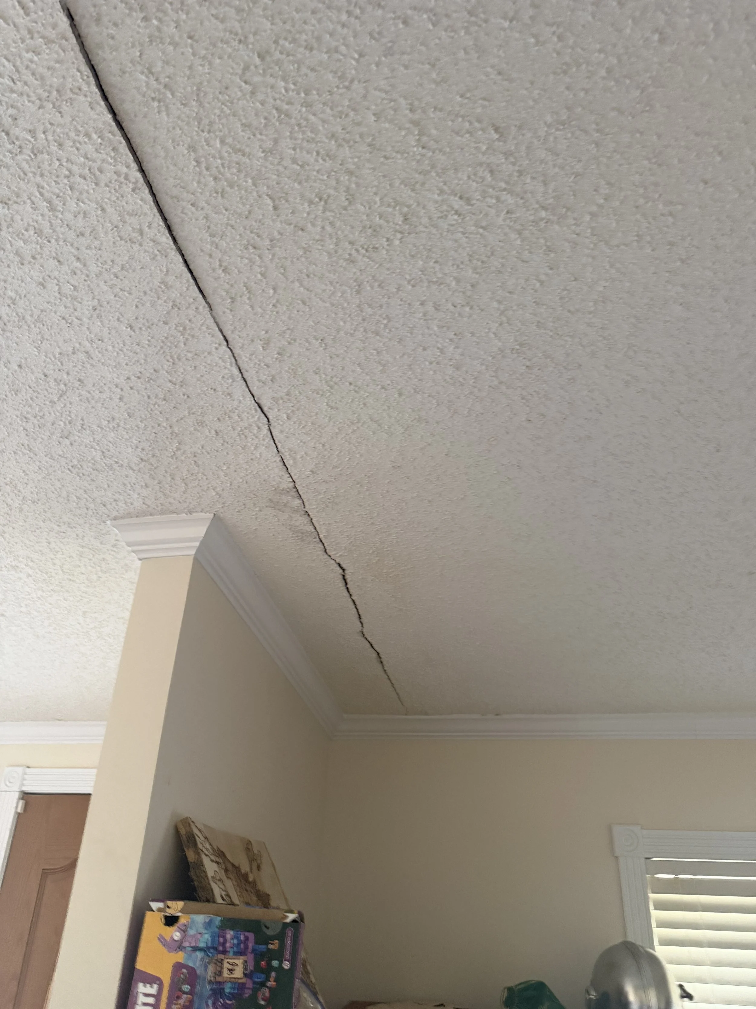 Visible ceiling crack buyers should notice during a home showing