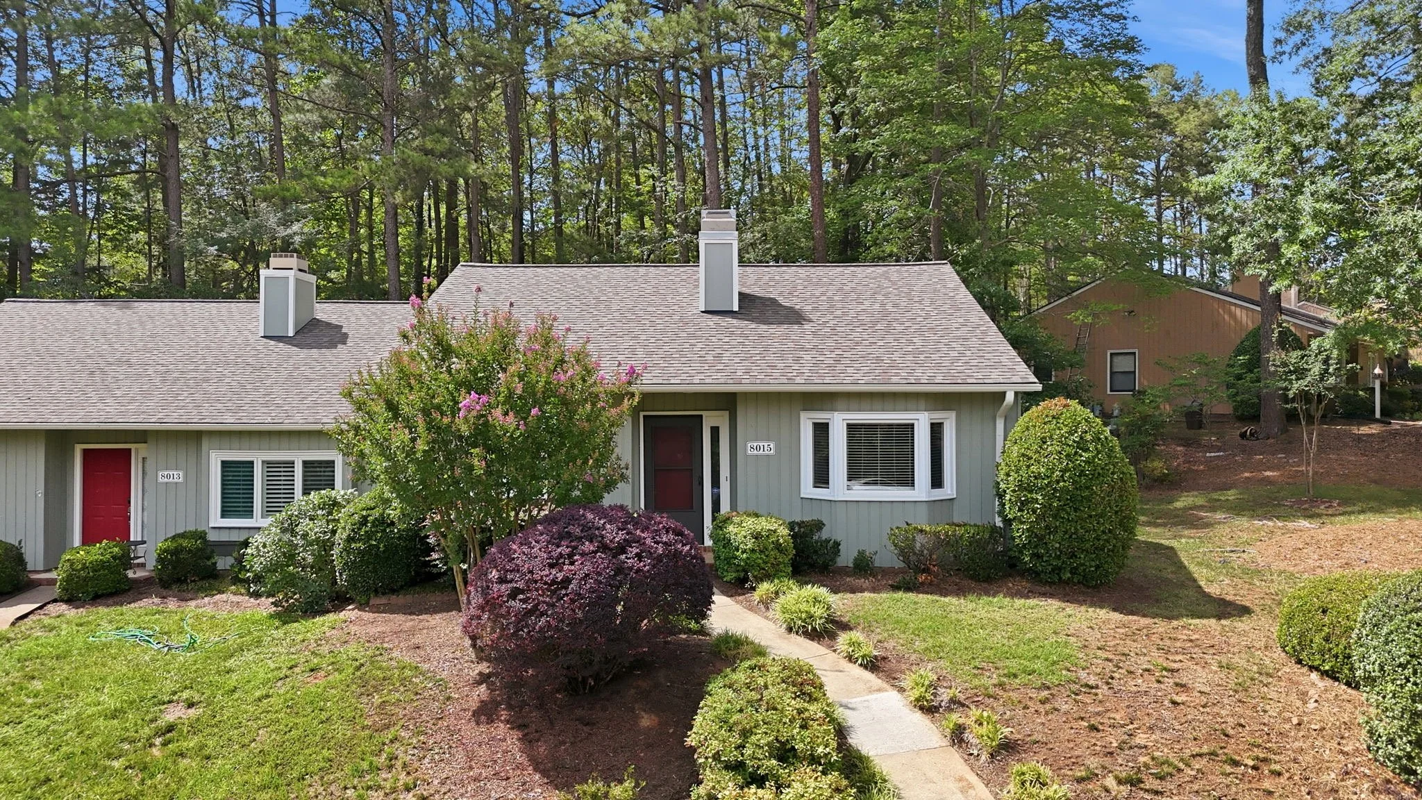 North Raleigh townhouse with landscaped yard and wooded surroundings
