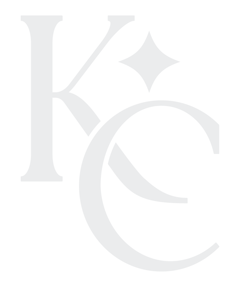 Stylized dark blue letter K and C with a star shape in between for Kim Cates Coaching in Paducah, Kentucky