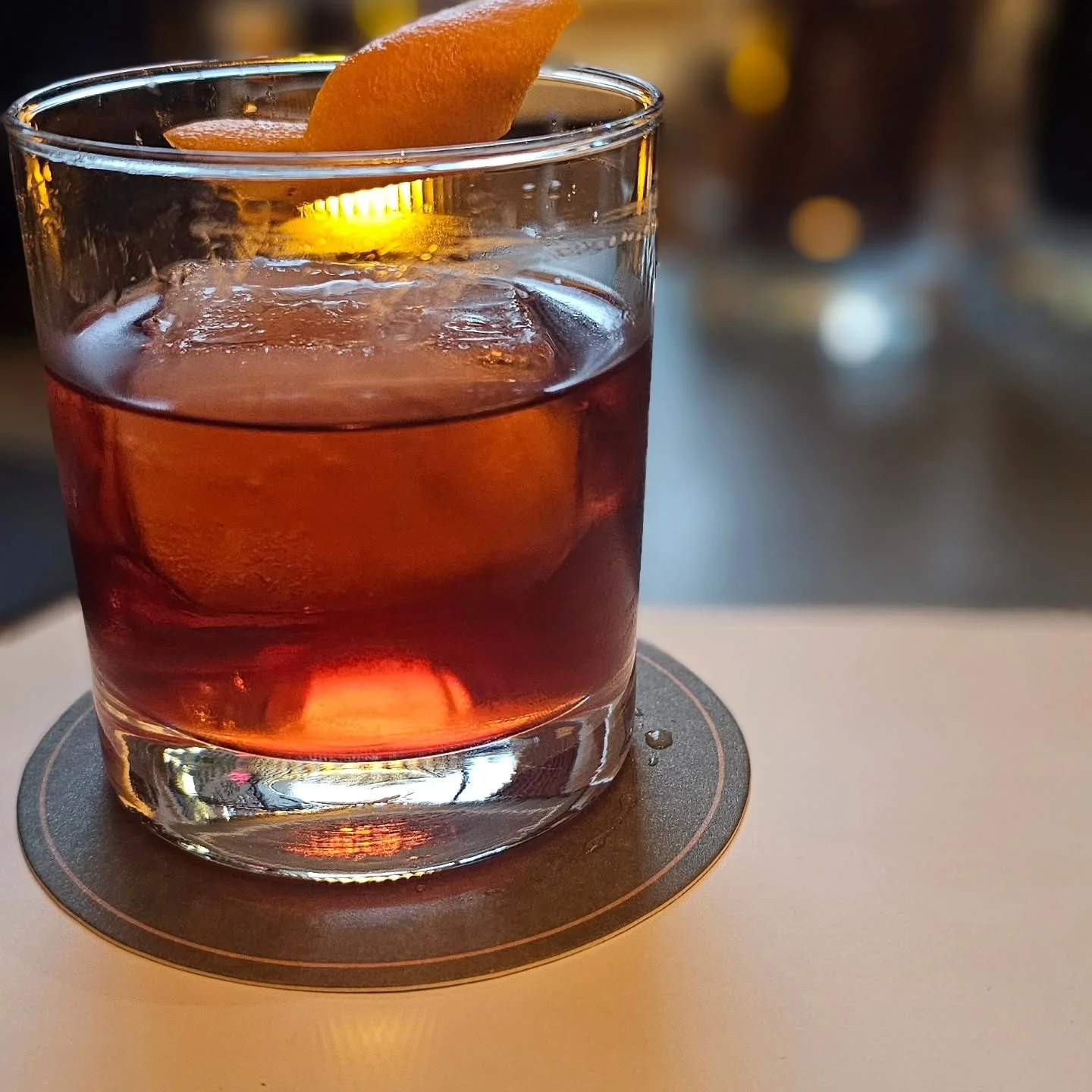 The pour:

Watershed Distillery Four Peel Gin (OH)
Antica Vermouth 
Campari 
Orange peel