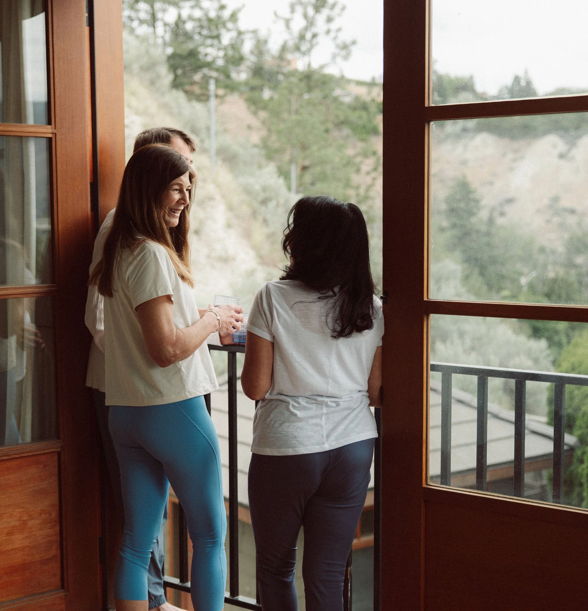 Two women connecting after a Block Therapy class at an Okanagan Valley wellness studio.