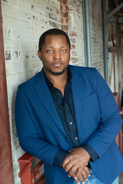A headshot of author Sylvester Allen, Jr.