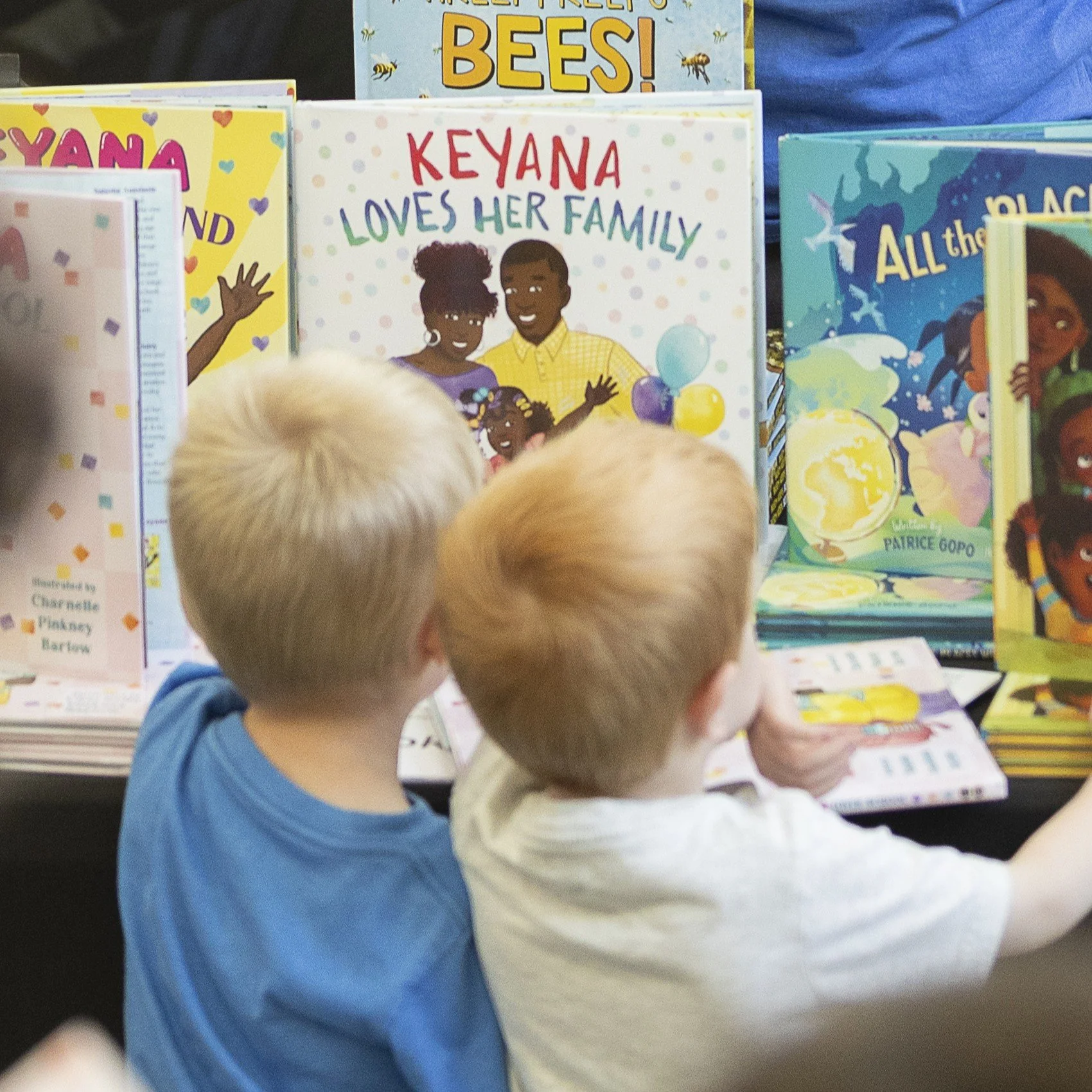 young children exploring picture books at the Greensboro Bound Book Festival