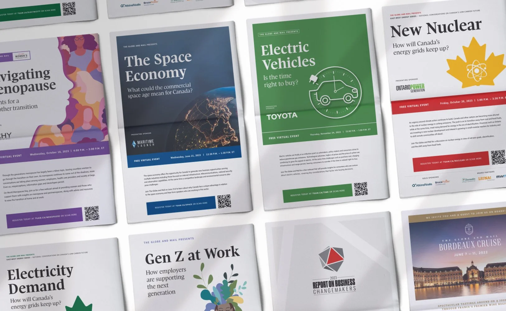 Collection of event flyers on various topics including space economy, electric vehicles, new nuclear energy, menopause, and business reports, arranged on a white surface.