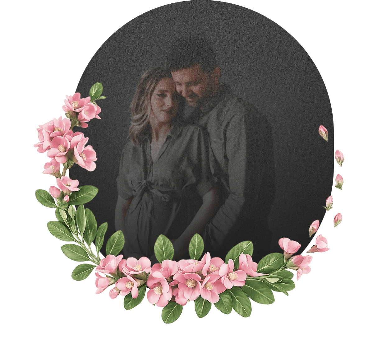 A romantic couple standing close together inside a floral frame of pink flowers and green leaves, with a dark background.