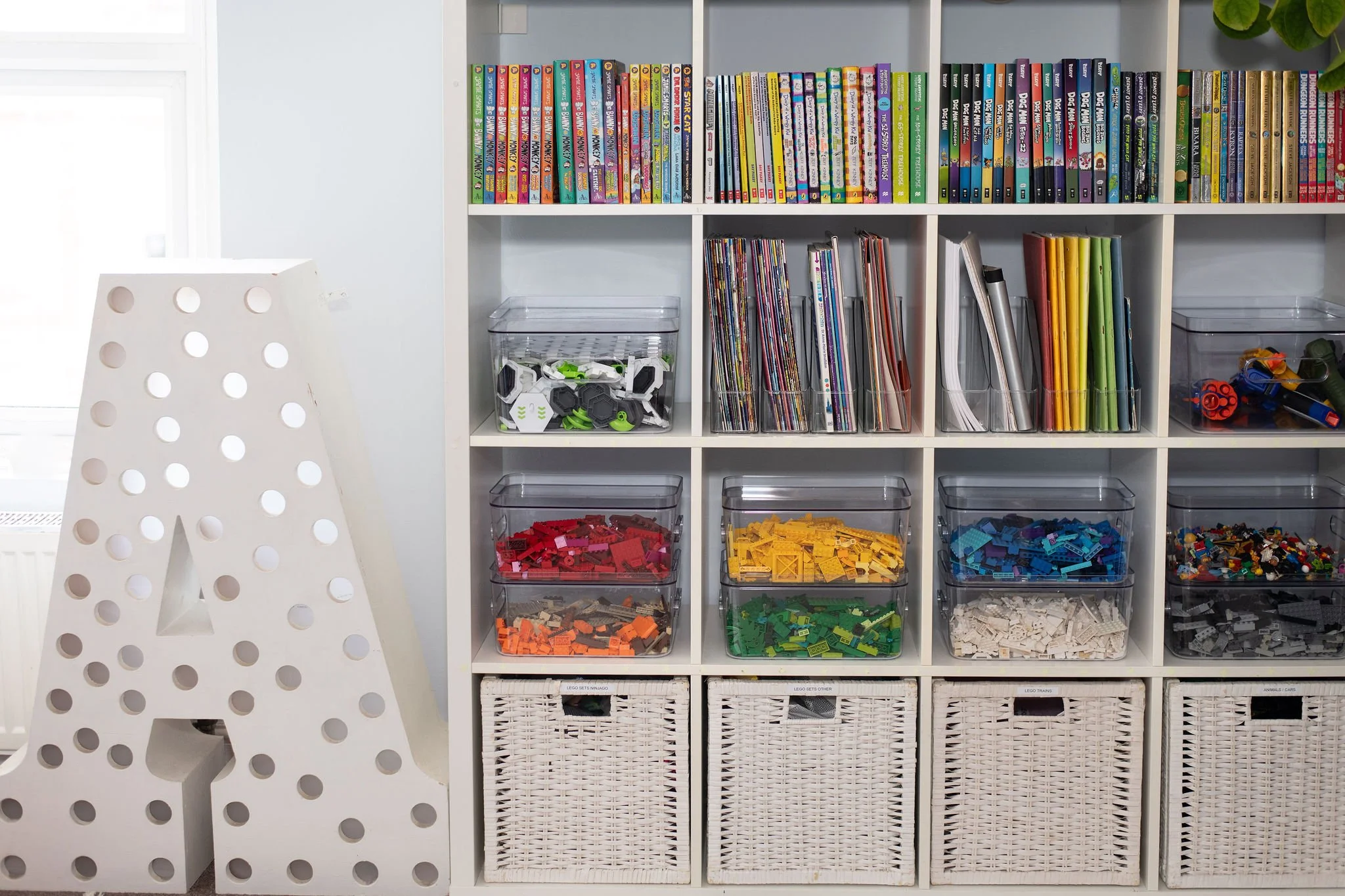 Home Reset Plan providing ongoing support to maintain organised and clutter-free spaces. Organised shelves in childrens room.