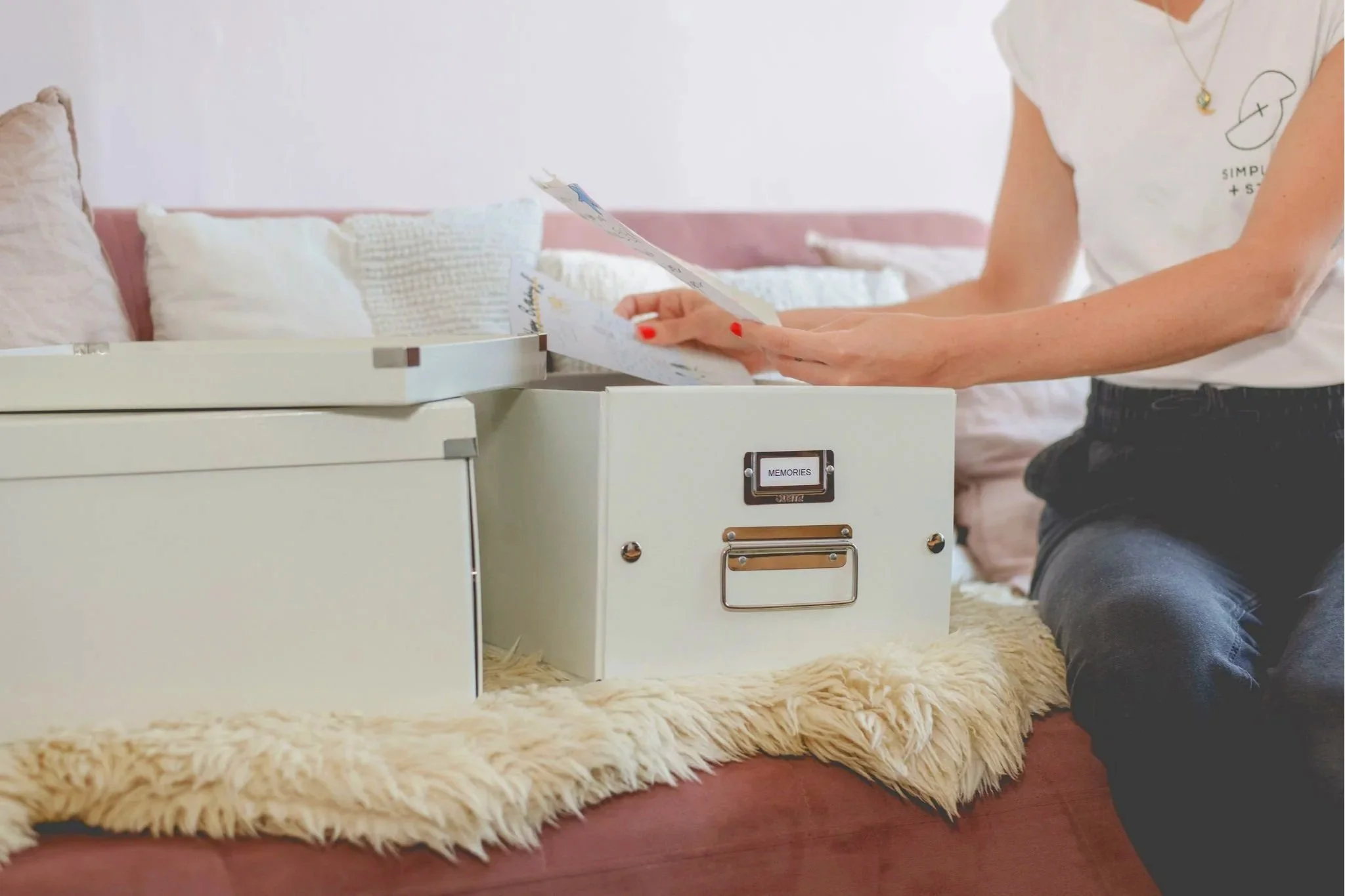 Professional home organising and decluttering support creating calm, organised and easy-to-maintain spaces. Filing into memory boxes.