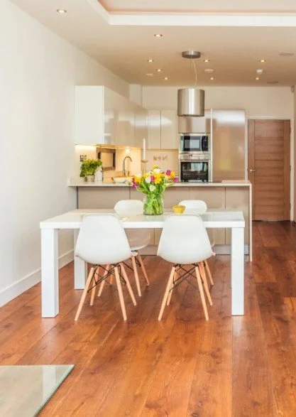 Dining area professionally staged to create a bright and welcoming first impression.